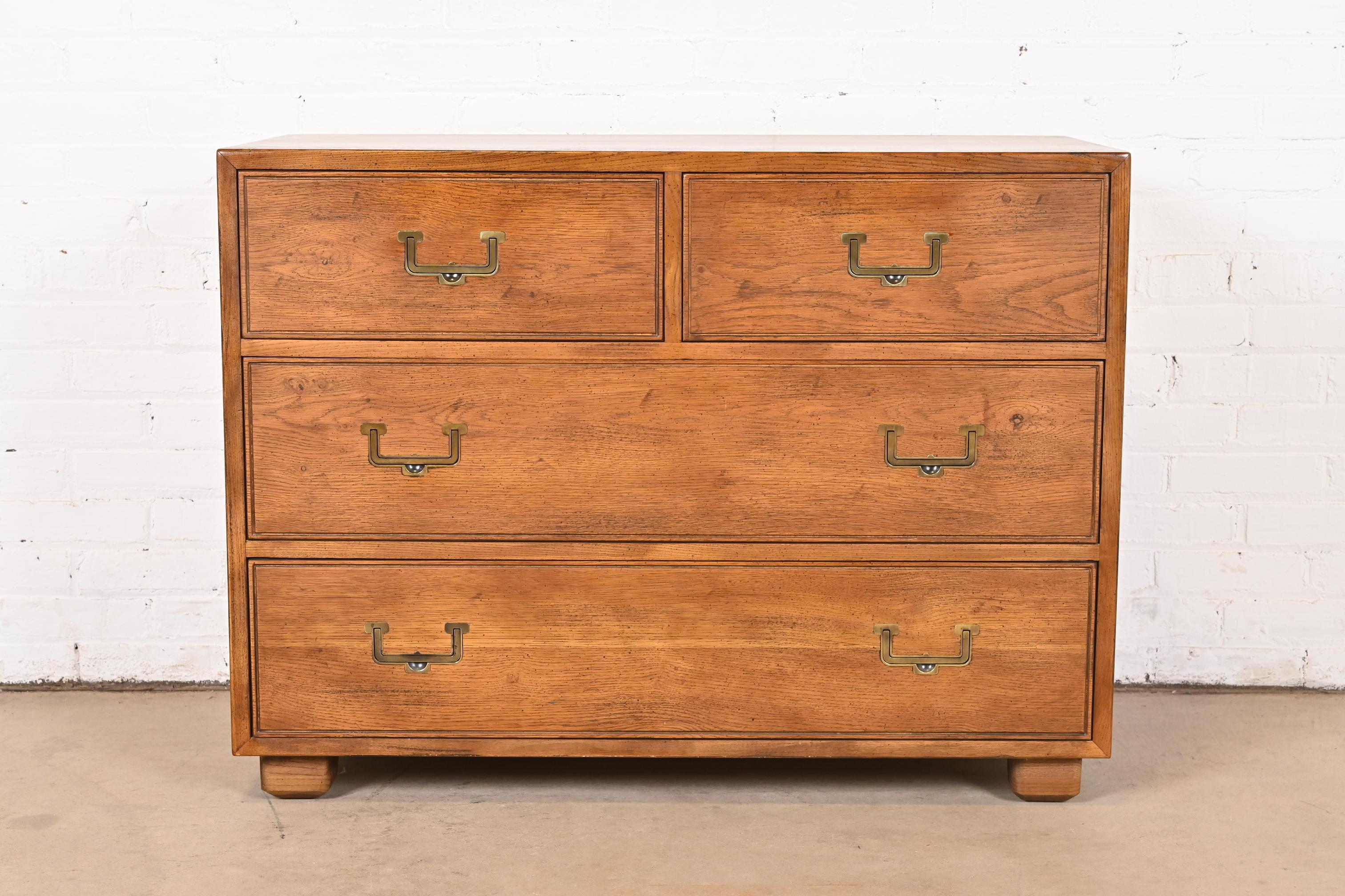 A gorgeous Mid-Century Modern Campaign style four-drawer dresser or chest of drawers

By Henredon, 