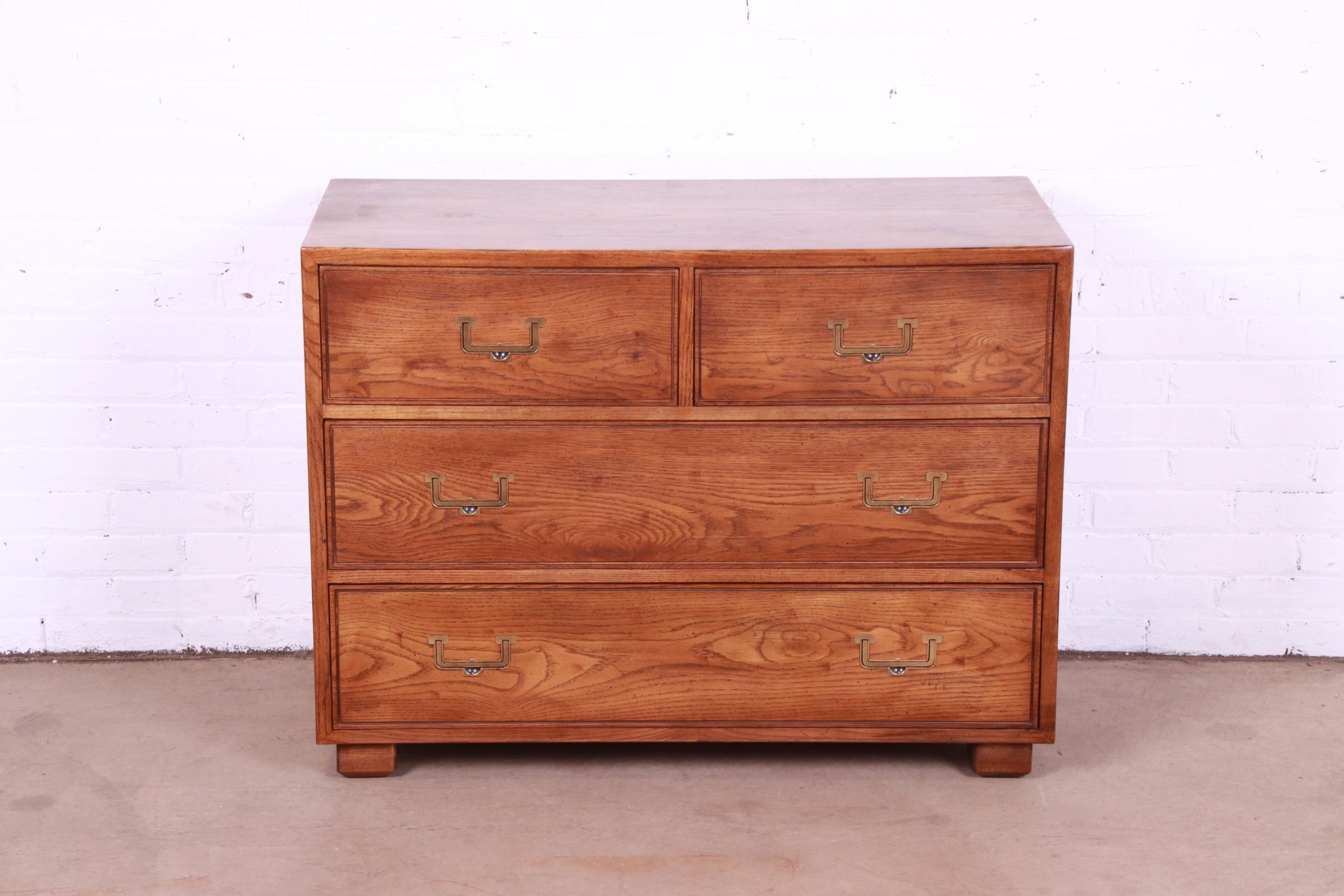 A gorgeous Mid-Century Modern Campaign style dresser or chest of drawers

By Henredon, 