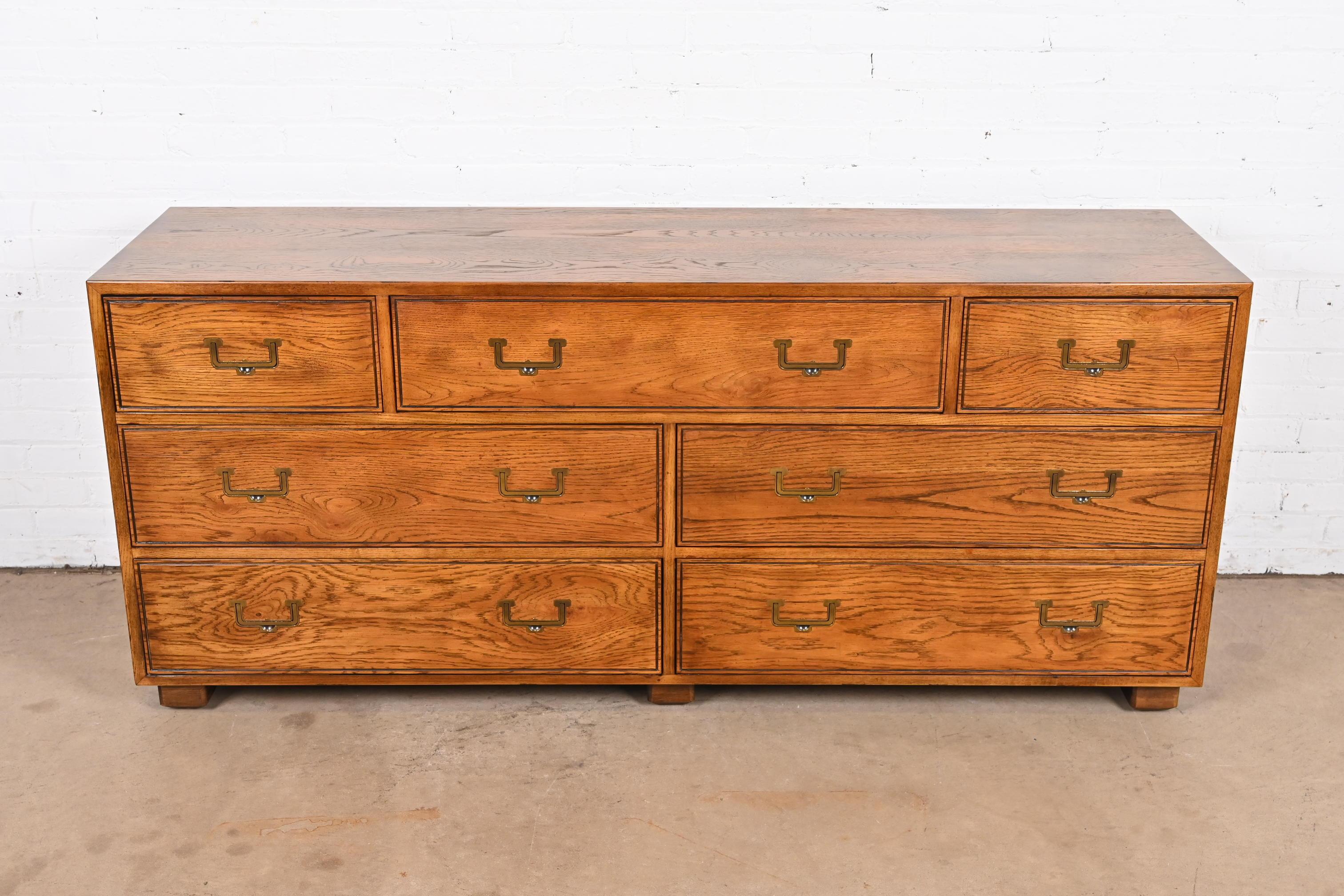 A gorgeous Mid-Century Modern Campaign style dresser or credenza

By Henredon, 