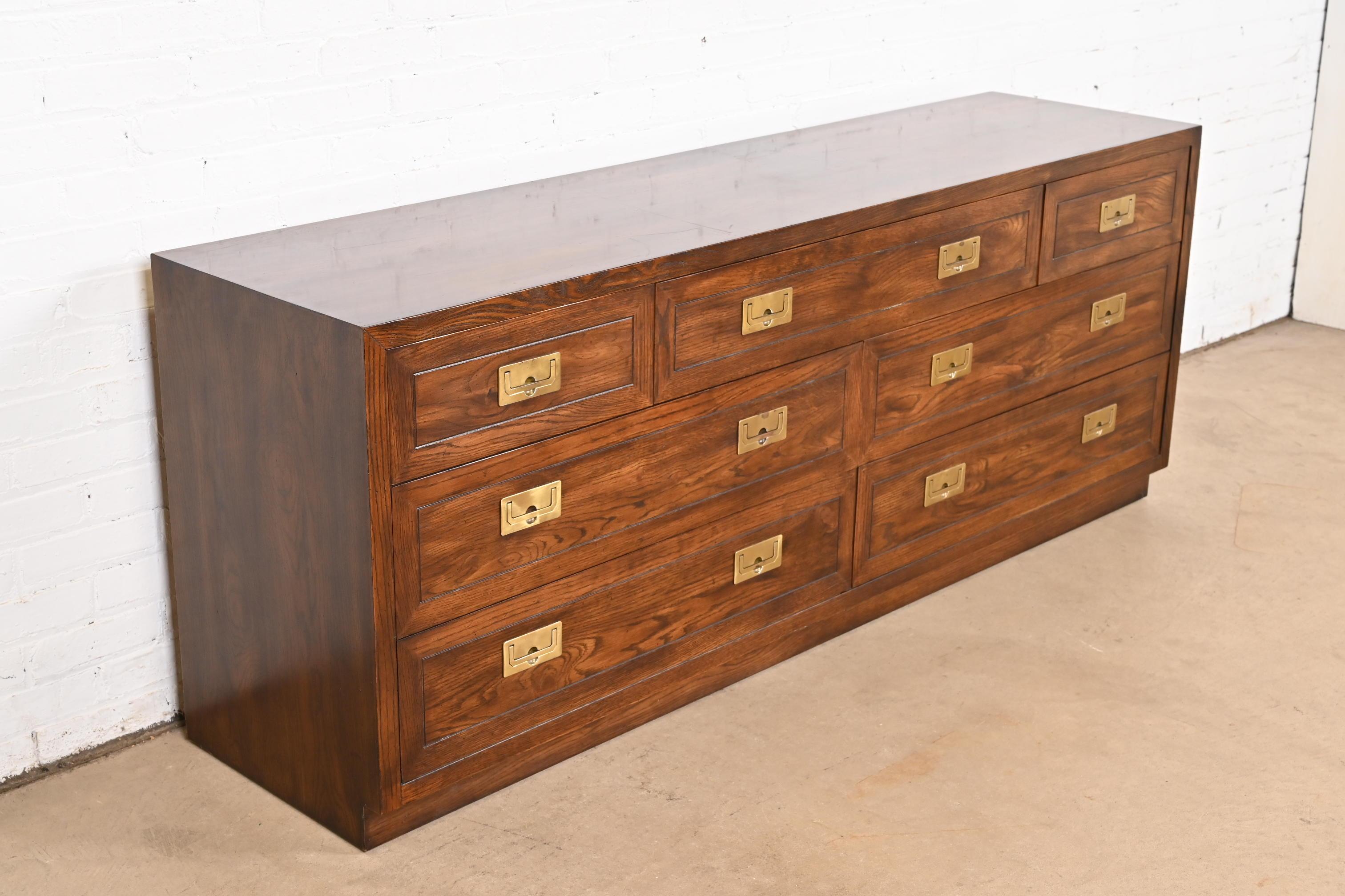 Late 20th Century Henredon Mid-Century Modern Hollywood Regency Campaign Oak Long Dresser, 1970s For Sale