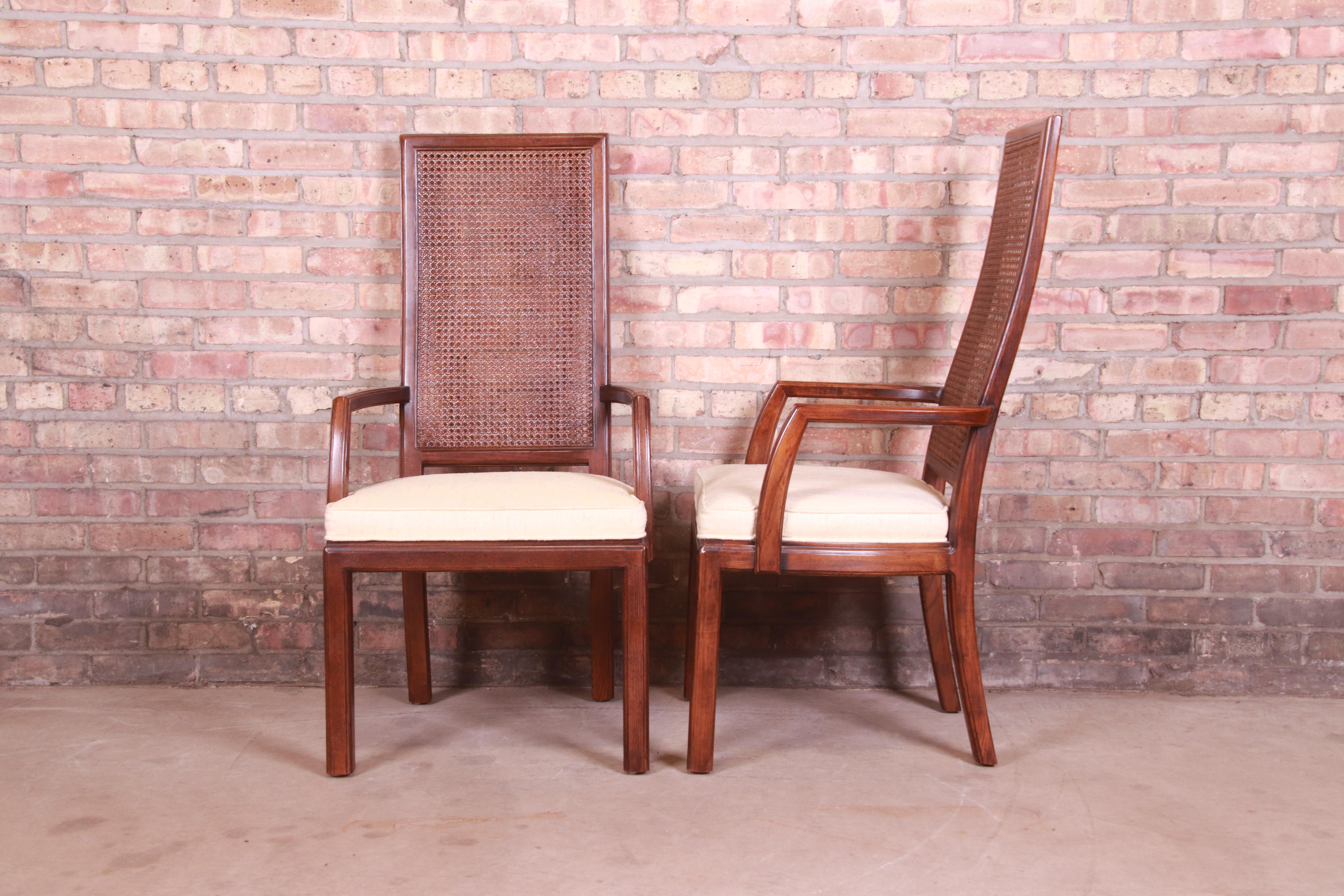 A gorgeous pair of Mid-Century Modern high back armchairs

By Henredon

USA, Circa 1970s

Oak frames, with cane backs and upholstered seats.

Measures: 22
