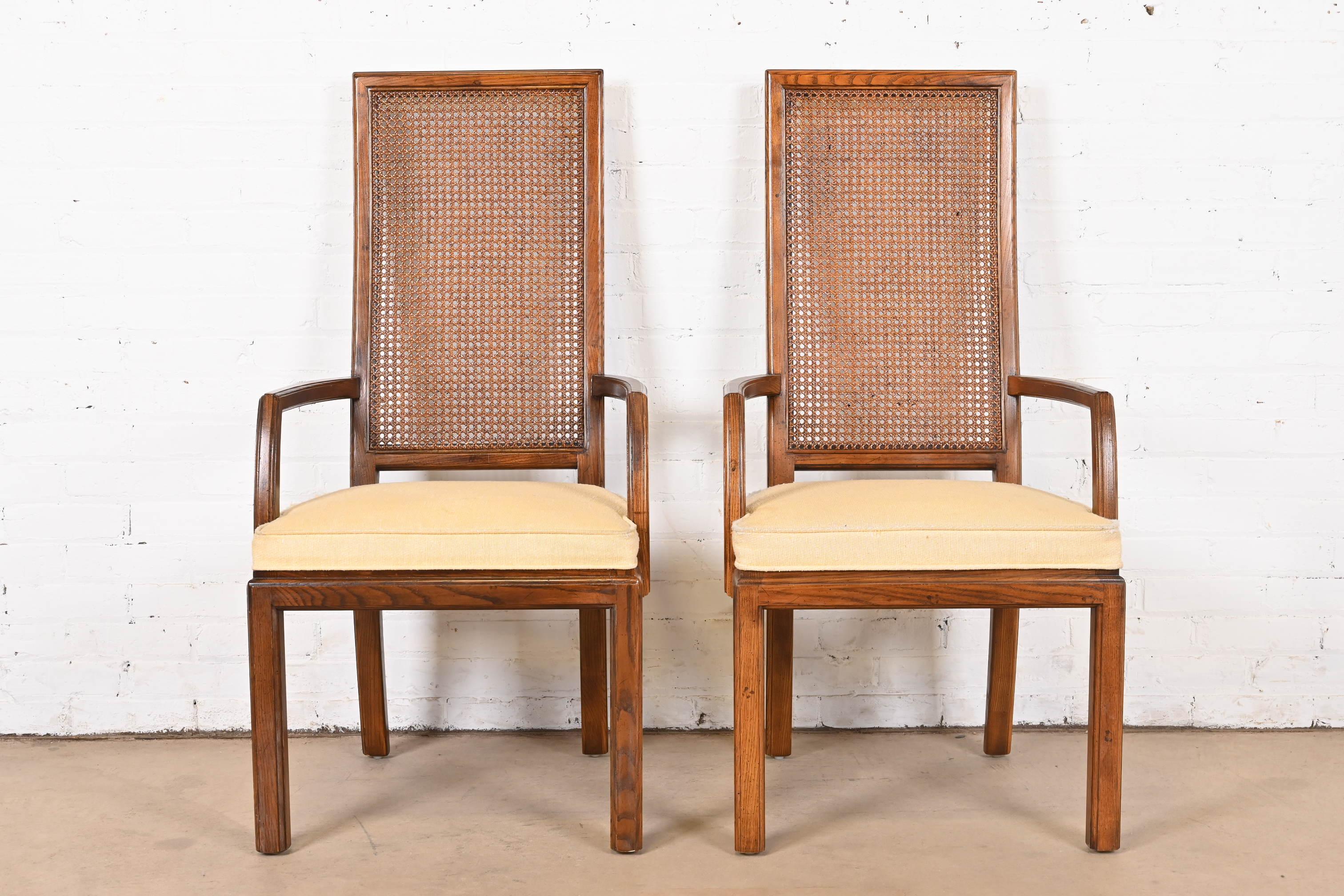 American Henredon Mid-Century Modern Oak and Cane High Back Dining Arm Chairs, Pair For Sale