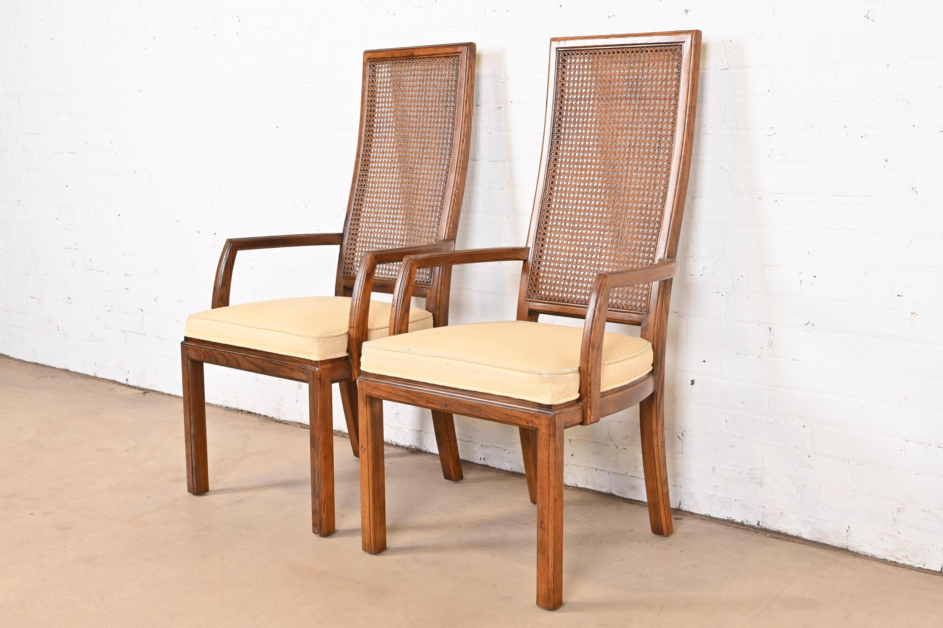 Late 20th Century Henredon Mid-Century Modern Oak and Cane High Back Dining Arm Chairs, Pair For Sale