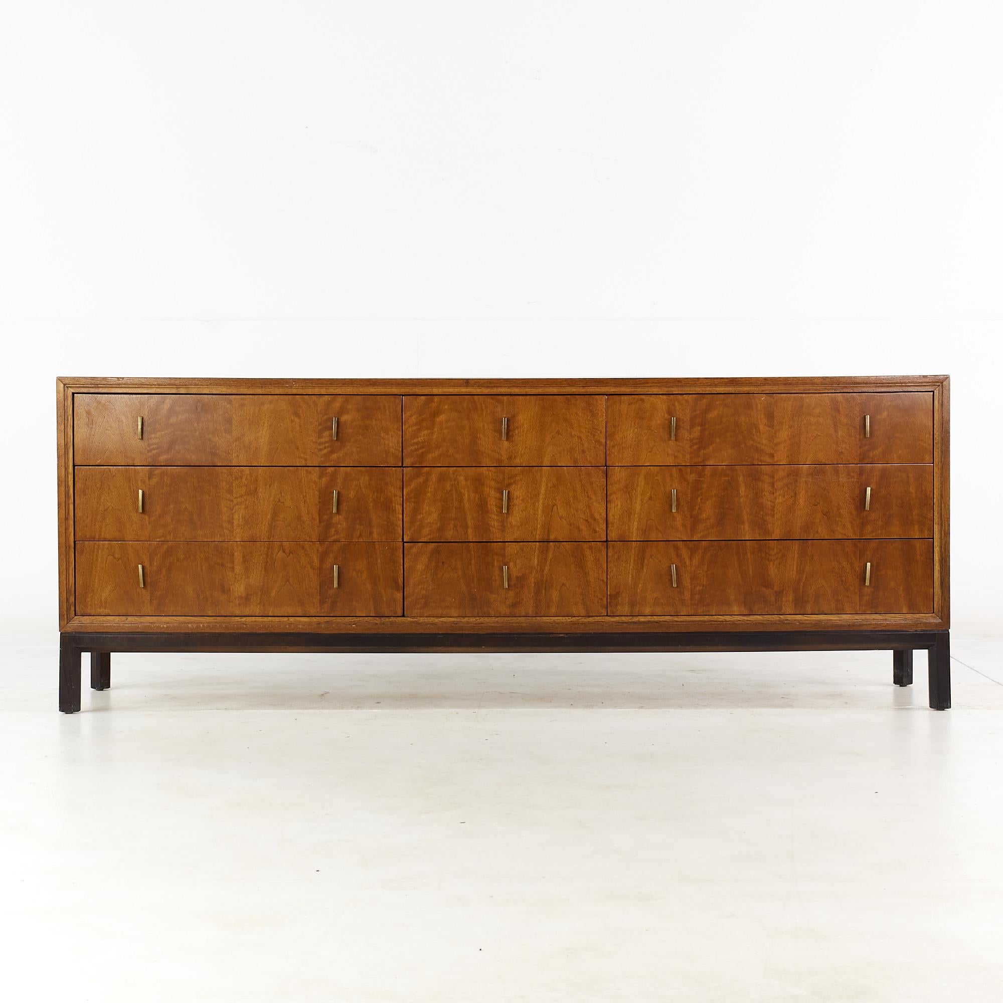 Henredon mid century walnut and brass 9 drawer lowboy dresser

This dresser measures: 80 wide x 19 deep x 30.25 inches high

All pieces of furniture can be had in what we call restored vintage condition. That means the piece is restored upon
