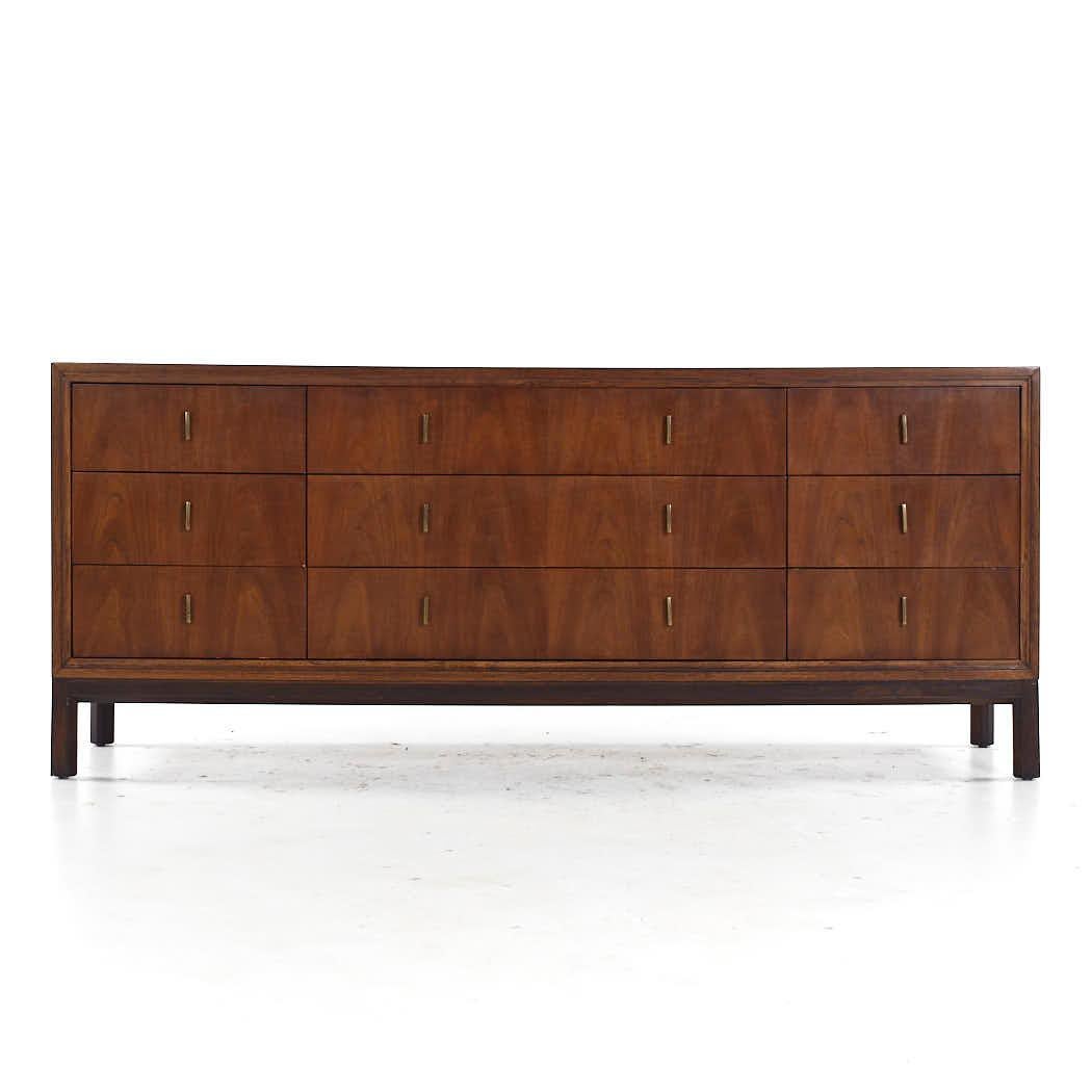 Henredon Mid Century Walnut and Brass 9 Drawer Lowboy Dresser

This lowboy measures: 72 wide x 19 deep x 30.25 inches high

All pieces of furniture can be had in what we call restored vintage condition. That means the piece is restored upon purchase