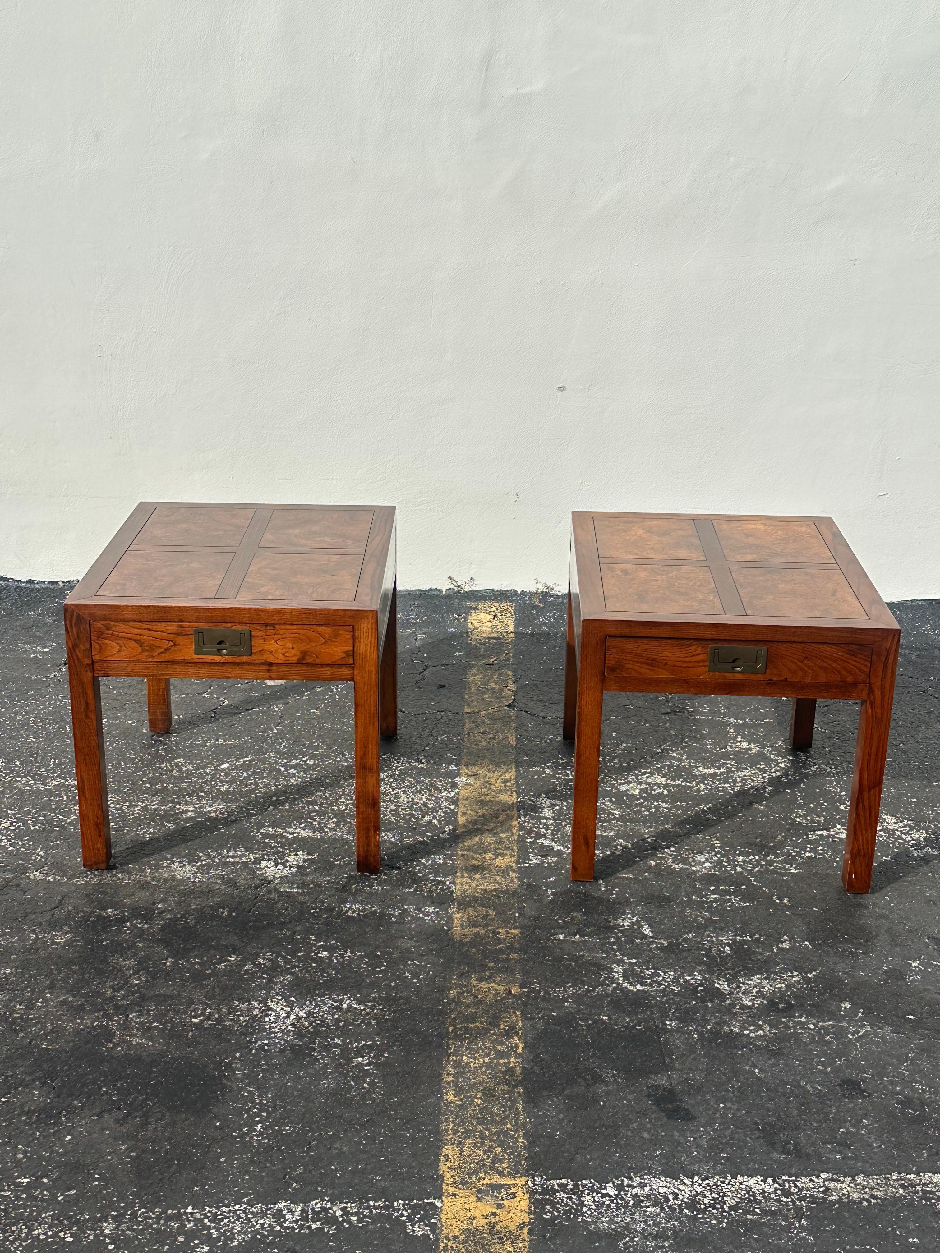 Classic Campaign styling from Henredon, pair of burl wide body walnut parsons side (or end) tables having a single recessed brass pull and striking parquetry tops.