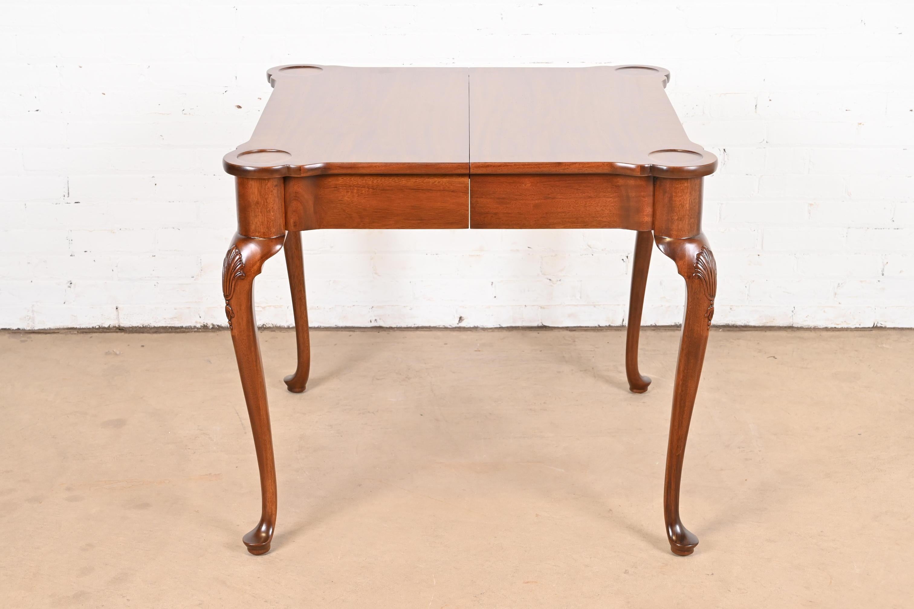 A gorgeous Queen Anne or Georgian style two-drawer game table or breakfast table

By Henredon, 