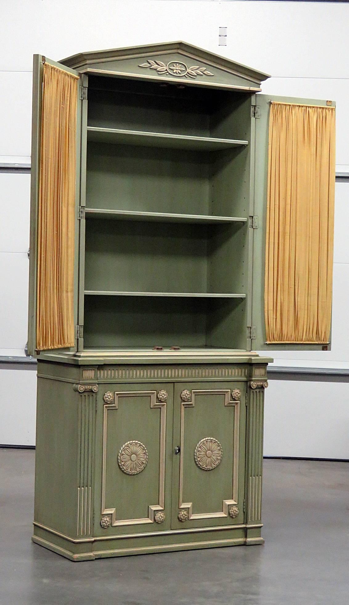 Henredon Regency style paint decorated china cabinet. Two piece, two doors and three shelves on each.