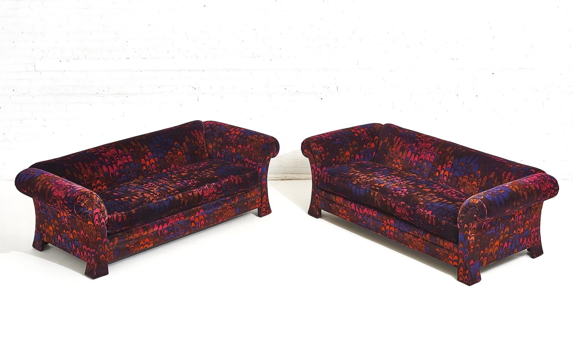 Pair of Henredon sofas covered in Jack Lenor Larsen “Aurora” velvet. Fabric is in excellent condition. Priced individually.