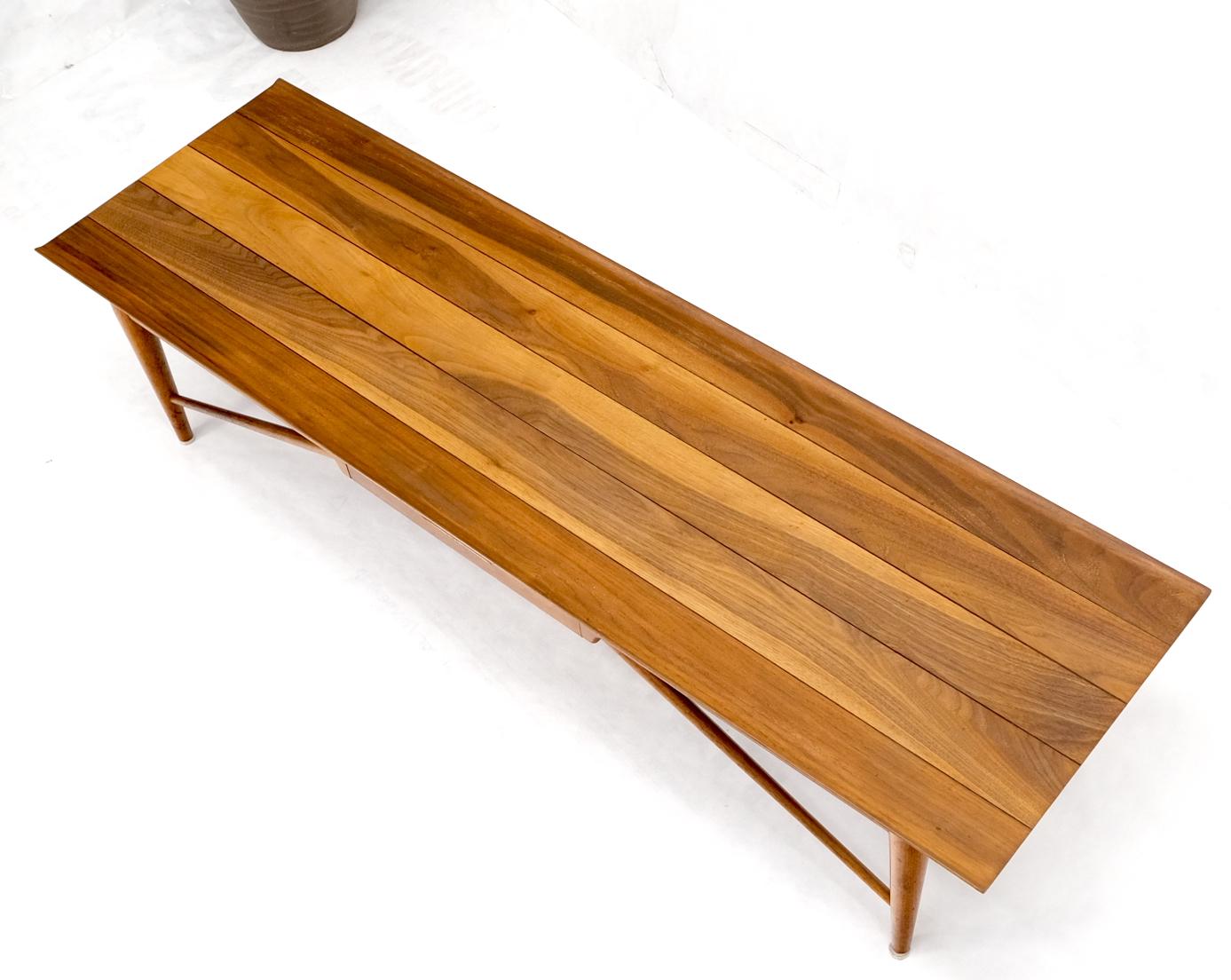 Mid-Century Modern stunning solid walnut grain long bench coffee table with rolled edges and one drawer similar to Edward Wormley for Dunbar bench.