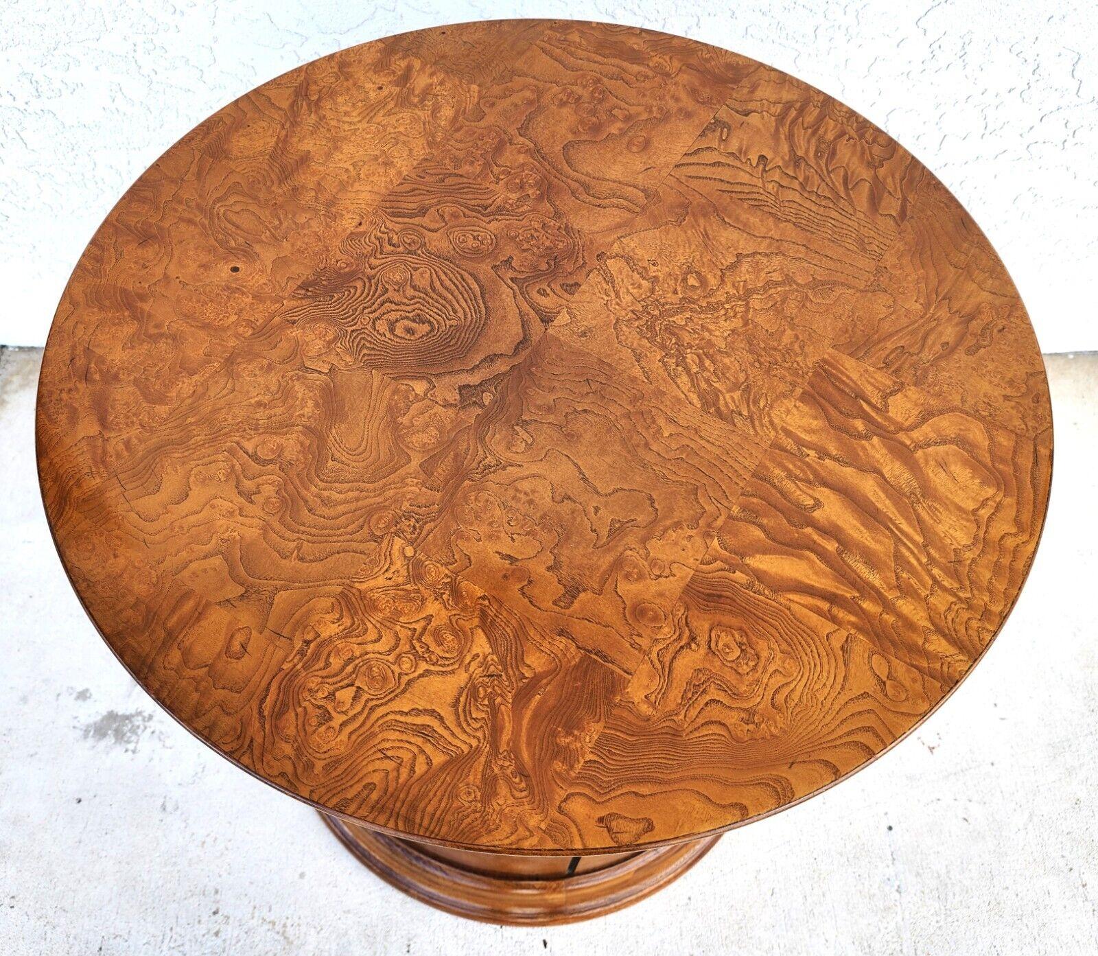 Offering One Of Our Recent Palm Beach Estate Fine Furniture Acquisitions Of A
Side End Drum Table in the Henredon Style
Solid real wood construction with vibrant Burl veneer, 2 doors and 1 shelf (non adjustable).
It's a very solid, heavy, and