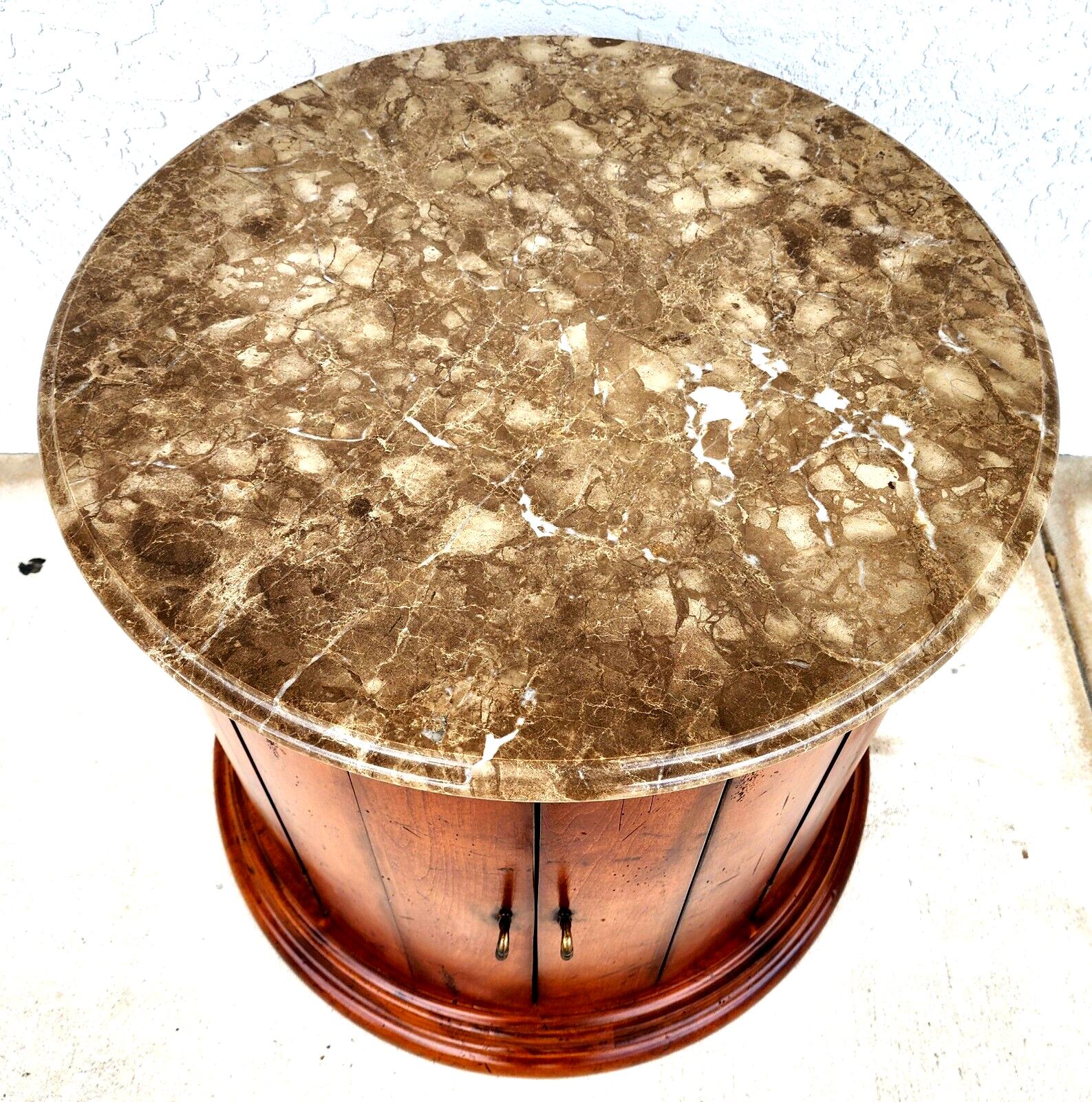 For FULL item description click on CONTINUE READING at the bottom of this page.

Offering One Of Our Recent Palm Beach Estate Fine Furniture Acquisitions Of A
Wonderful Henredon Style Marble Top Drum Table
This is a very well-built and solid piece