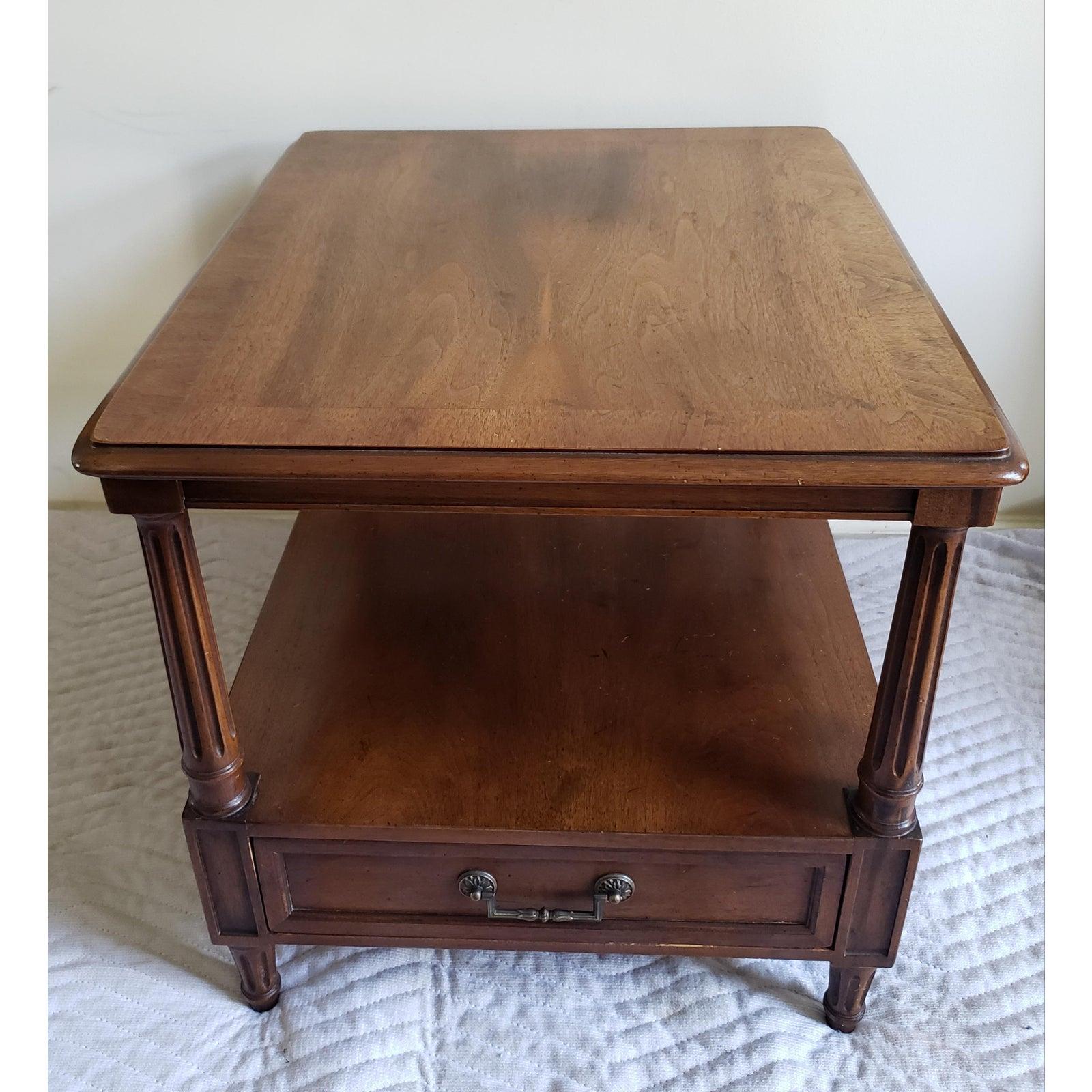 Henredon solid walnut side table with one bottom drawer. Original Hardware. Excellent Condition with some signs of use. Measures 22