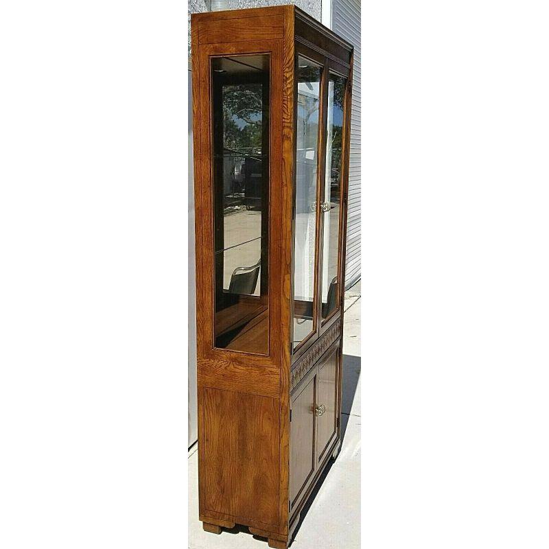 Offering one of our Recent Palm Beach Estate Fine Furniture Acquisitions of 
A Henredon Vera Cruz Campaign Style Vitrine Curio display case buffet cabinet

Measurements
84 1/2