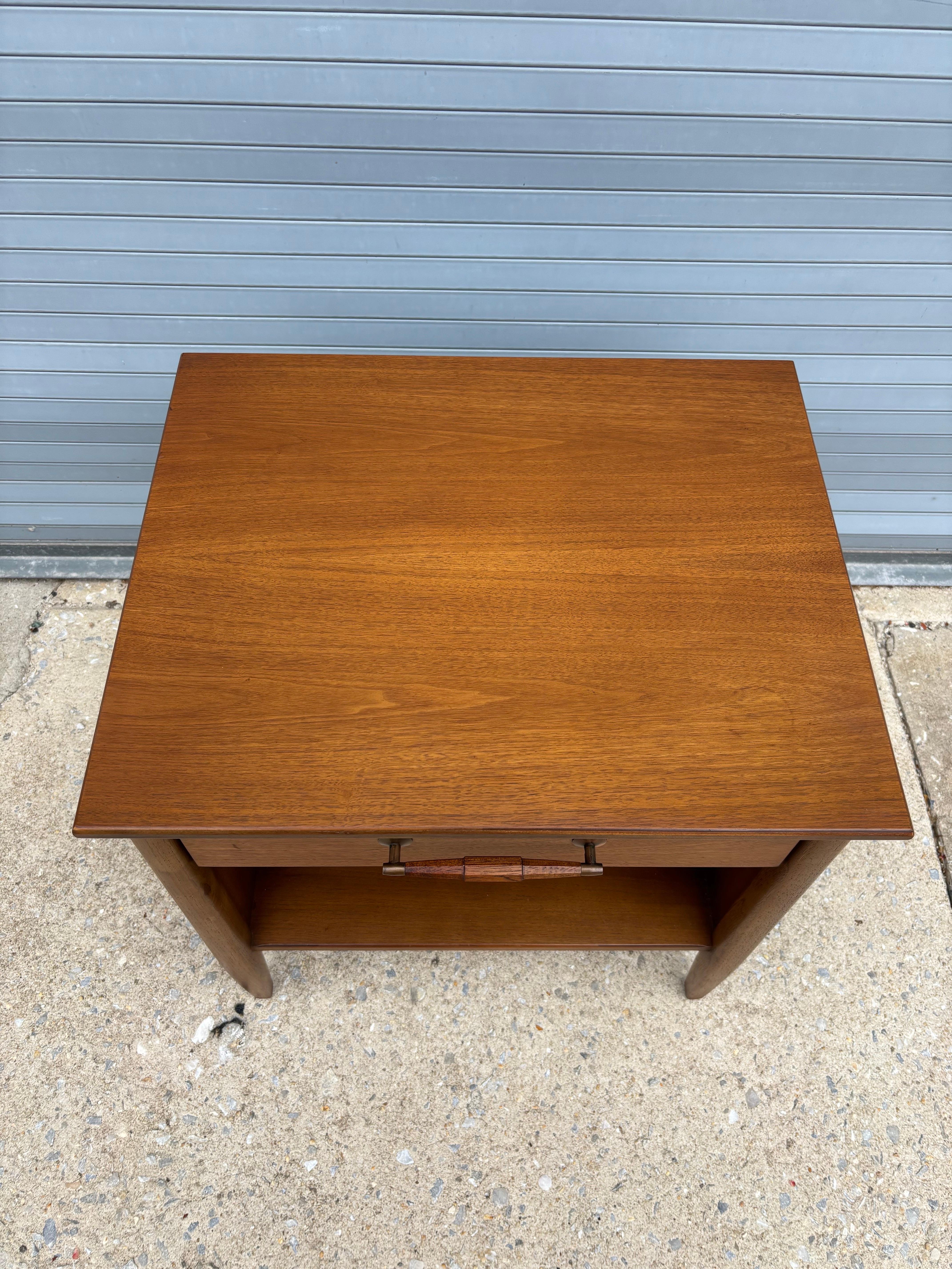 Henredon Furniture Single Nightstand.  Overall nice condition with a wood turned handle.  Finish has faint ring mark top front right as seen in photo.  Matching Low Dresser in separate listing.