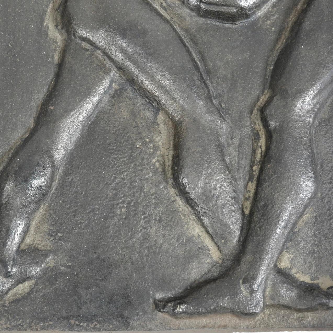 Henri-Albert Lagriffoul (1907-1981), attributed to. Cast iron fireback decorated with two athlete twin men carrying a water clock Circa 1935
