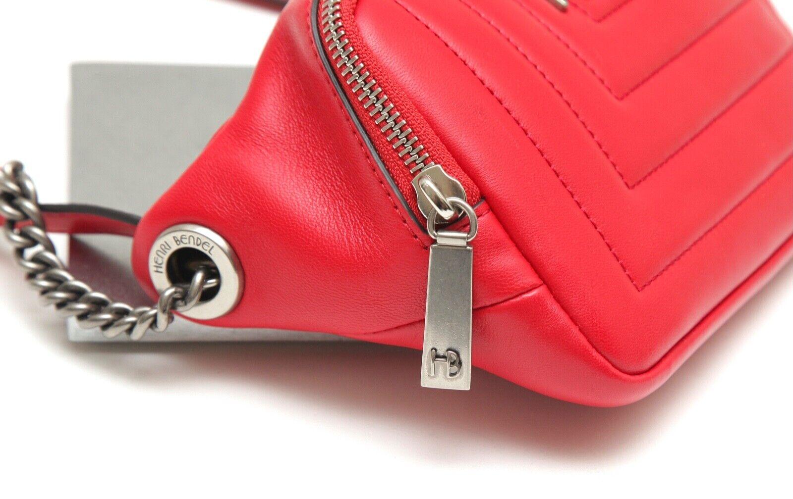 
GUARANTEED AUTHENTIC HENRI BENDEL RED LEATHER BELT BAG

- Classic belt bag in a quilted red leather.
- Gunmetal hardware.
- Adjustable belt.
- One main interior interior compartment with credit card slots and slip pocket.
- Comes with dust