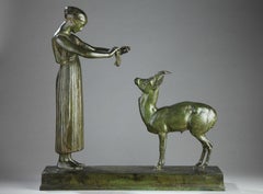 Woman and Gazelle, bronze sculpture