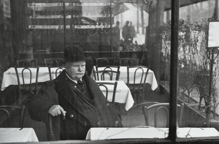 Henri Cartier-Bresson Black and White Photograph - Man at Cafe, Avenue du Maine, Paris