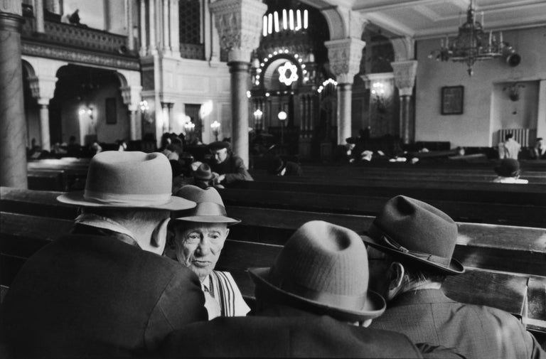 Saturday in the Synagogue, Leningrad, 1973 - Henri Cartier-Bresson 
Signed and stamped with photographer's blind stamp
Silver gelatin print, printed 1980s
11 x 14 inches

Henri Cartier-Bresson (1908-2004), arguably the most significant photographer