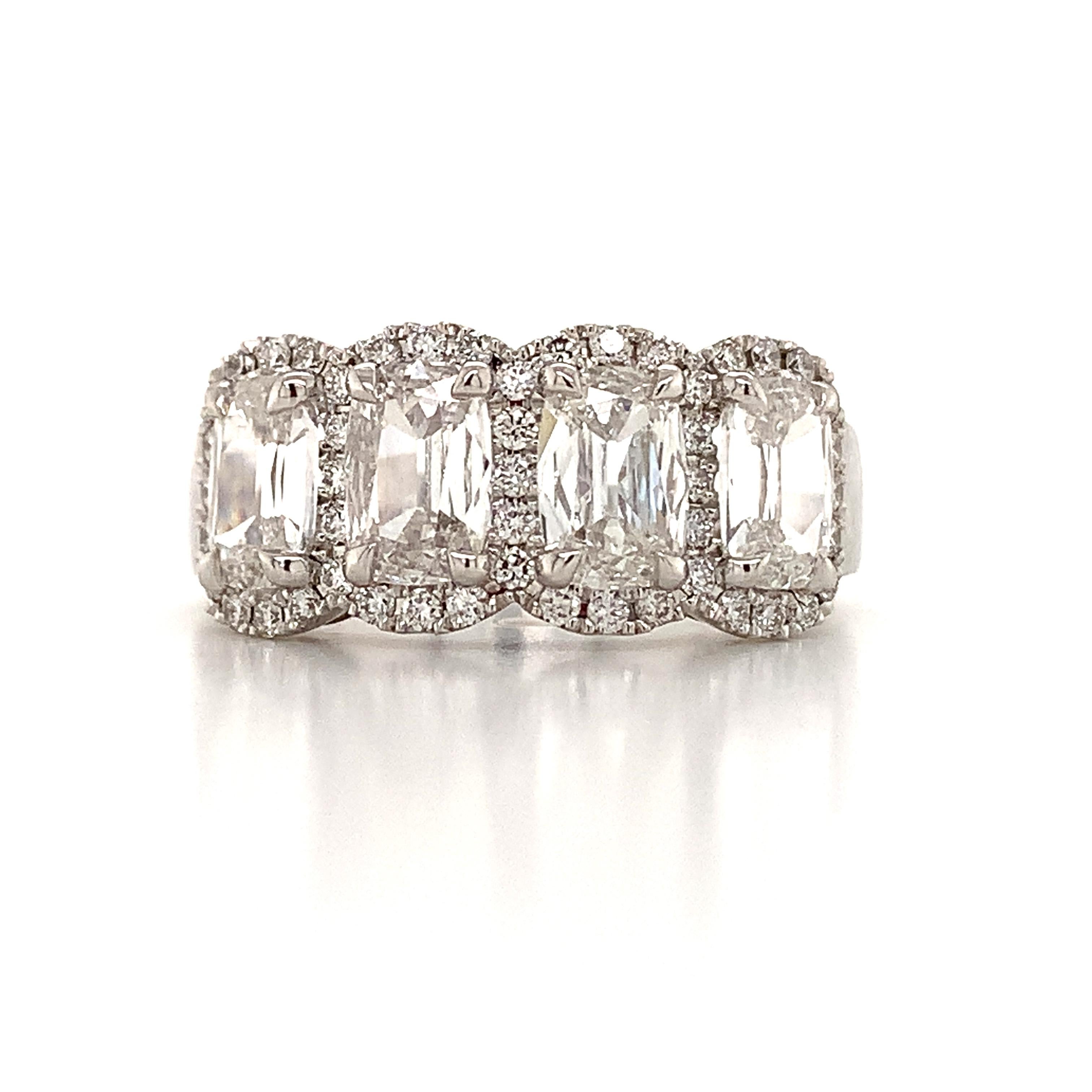 Four Stone Diamond Anniversary Ring.
Metal: 18K White Gold
Diamond: 4 Cushion Cut
Carat Weight: 2.46ctw
Color & Quality: G - VS1
Certification: Henri Daussi
Pave: 49 Diamonds 0.36cts
SKU: 126243