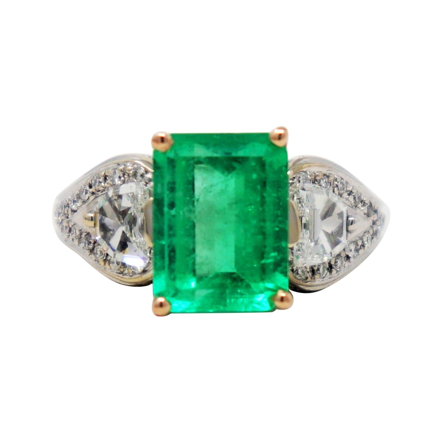 Henri Daussi 4.04 Carats Total Emerald Cut Emerald and Diamond Three Stone Ring For Sale