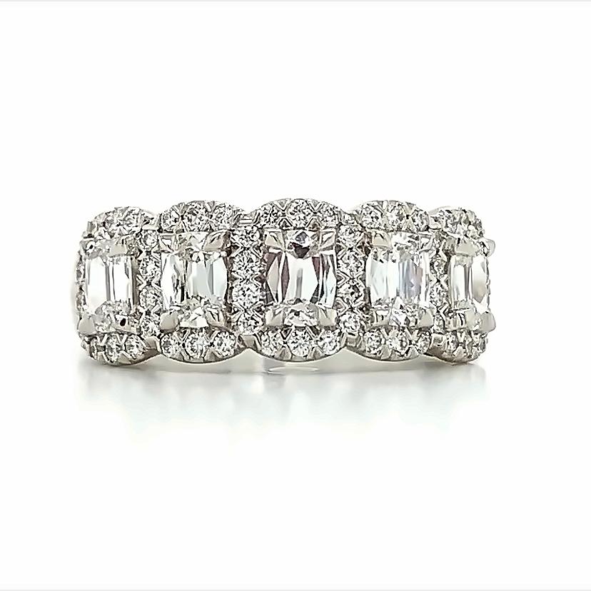 With its beginnings in Antwerp, Belgium over 40 years ago, the design house of Henri Daussi created gorgeous diamond rings conceived of artistic passion and expert techniques. From Henri Daussi, here we have a beautiful halo-styled 1.50ct t.w.