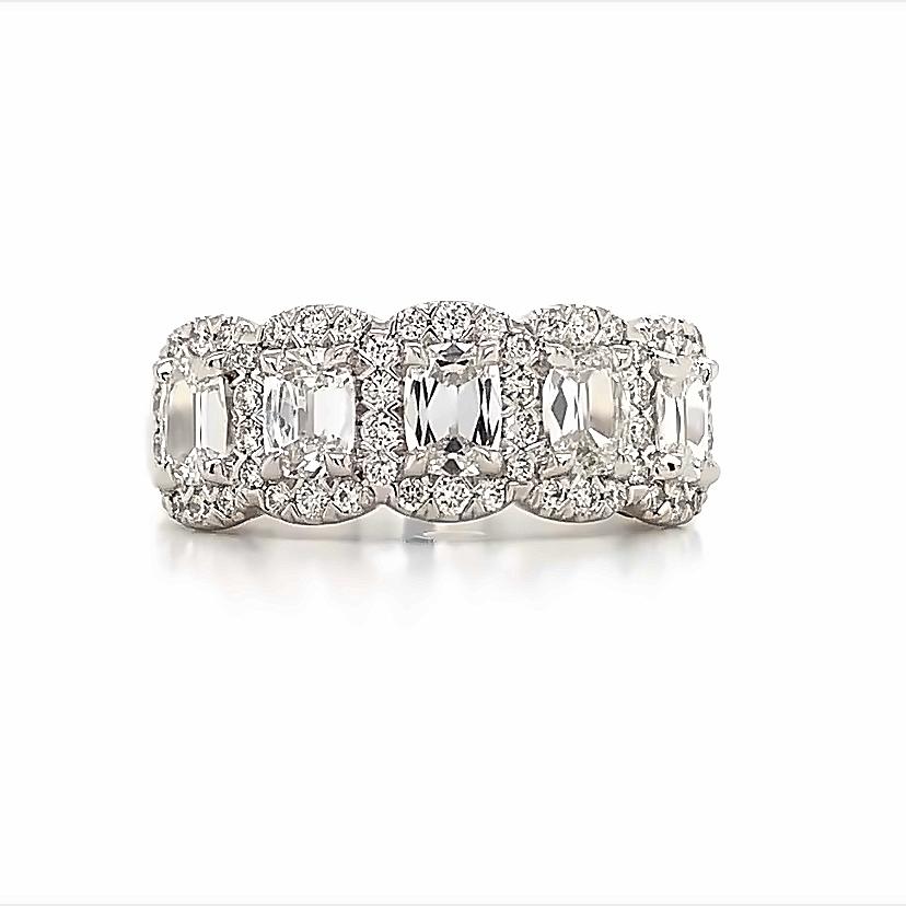 With its beginnings in Antwerp, Belgium over 40 years ago, the design house of Henri Daussi created gorgeous diamond rings conceived of artistic passion and expert techniques. From Henri Daussi, here we have a beautiful halo-styled 1.50ct t.w.
