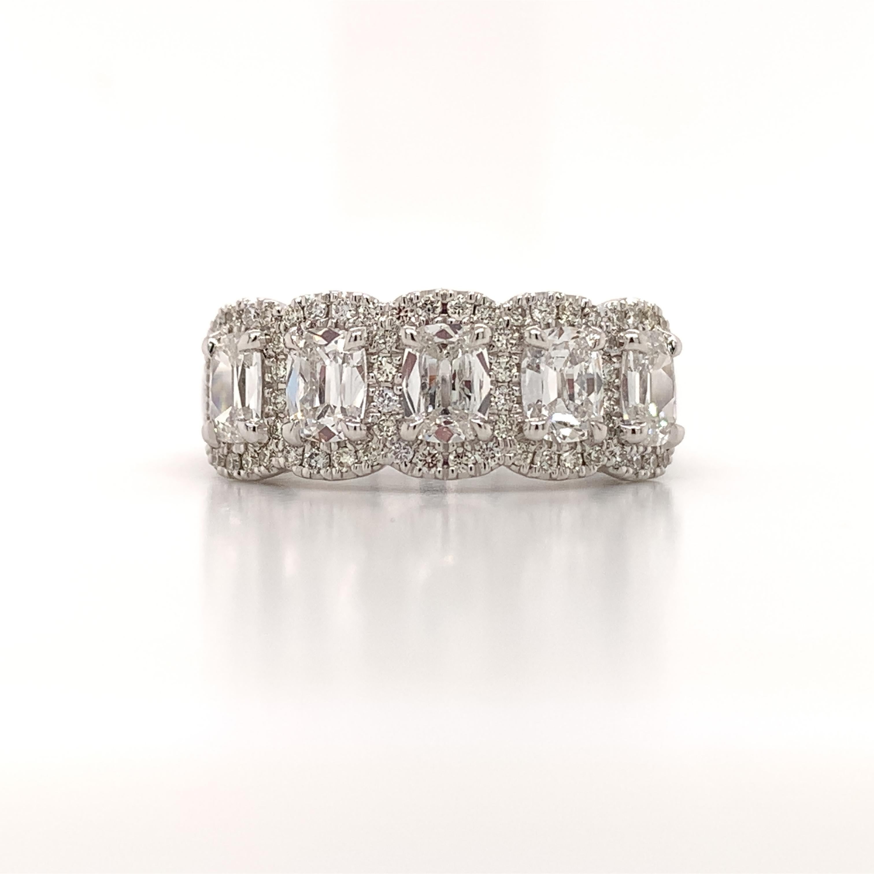 Five Stone Cushion Cut Halo Ring
Metal: 18K White Gold
Diamond Shape: Cushion-Cut
Diamond Details: 5 Cushion 1.46ctw
Pave Set Halo 64 Round Brilliant cuts 0.31ctw
Diamond Details: H color - SI1 clarity
Certification: Henri Daussi
SKU: 126529