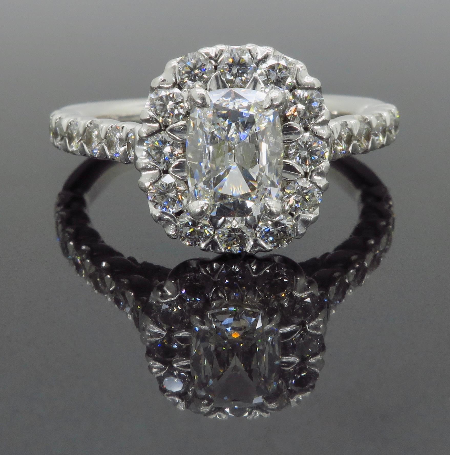 Henri Daussi Signature Halo Diamond Engagement Ring in 18 Karat White Gold 1