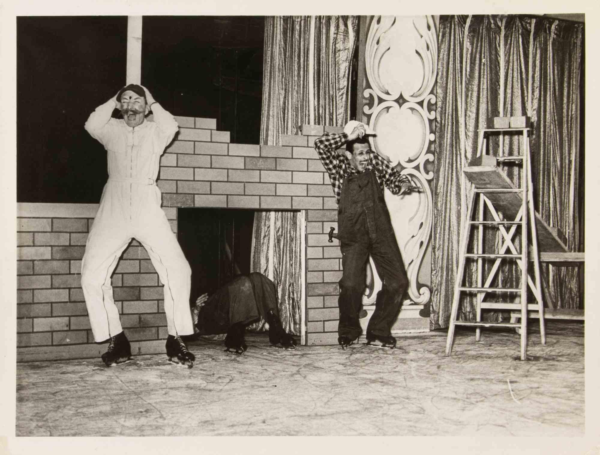 The Clowns is a black and white vintage photo, realized in 1950s, by Henri De Jonghe.

Good conditions and aged.

It belongs to a historical and nostalgic album including historical moments, places, families, artworks, royal families, and political