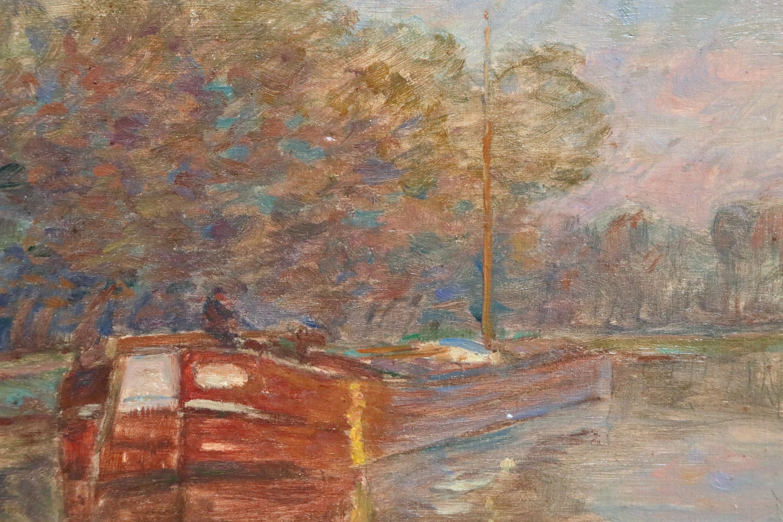 A wonderful oil on panel by Henri Duhem depicting a lone man on a barge sailing down the canal in Douai, one of Henri Duhem's favourite subjects. Signed lower left and dated 1908 verso. This painting is not currently framed but a suitable frame can