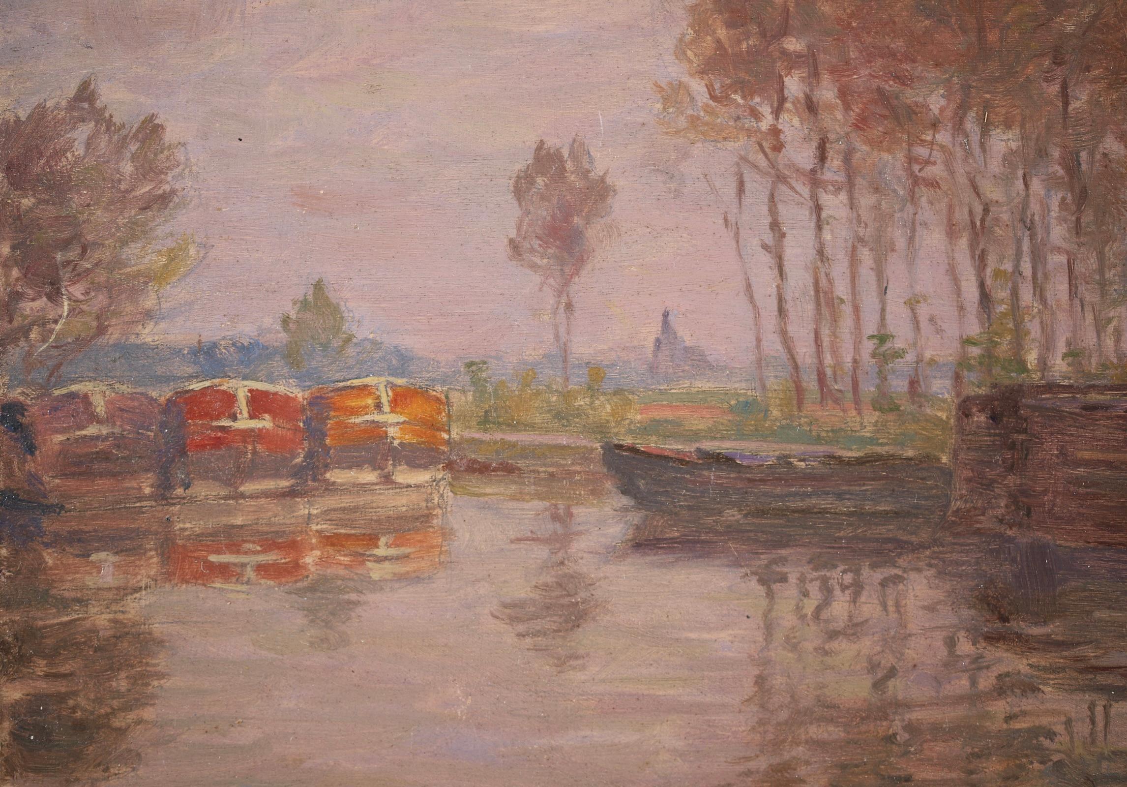 Signed and dated oil on panel by French impressionist painter Henri Duhem. The painting depicts a number of barges moored on the river on a cool autumn day. The leaves on the row of trees on the river's edge are starting to turn brown and they