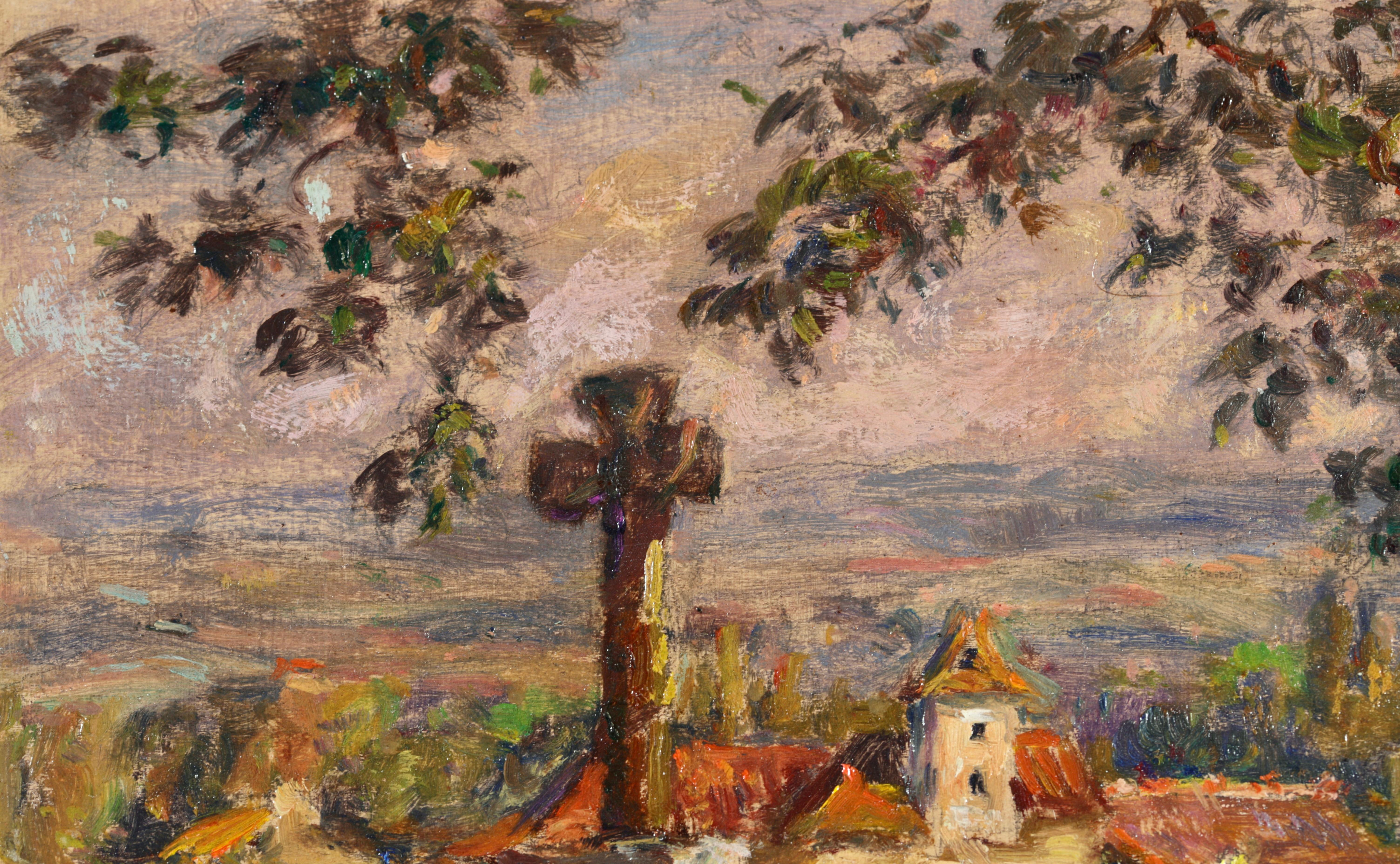 Signed and dated 1927 landscape oil on panel by French impressionist painter Henri Duhem. This beautiful piece depicts a view of a church in the centre of of a beautiful green spring landscape. The work is painted from the view from a lane shaded by