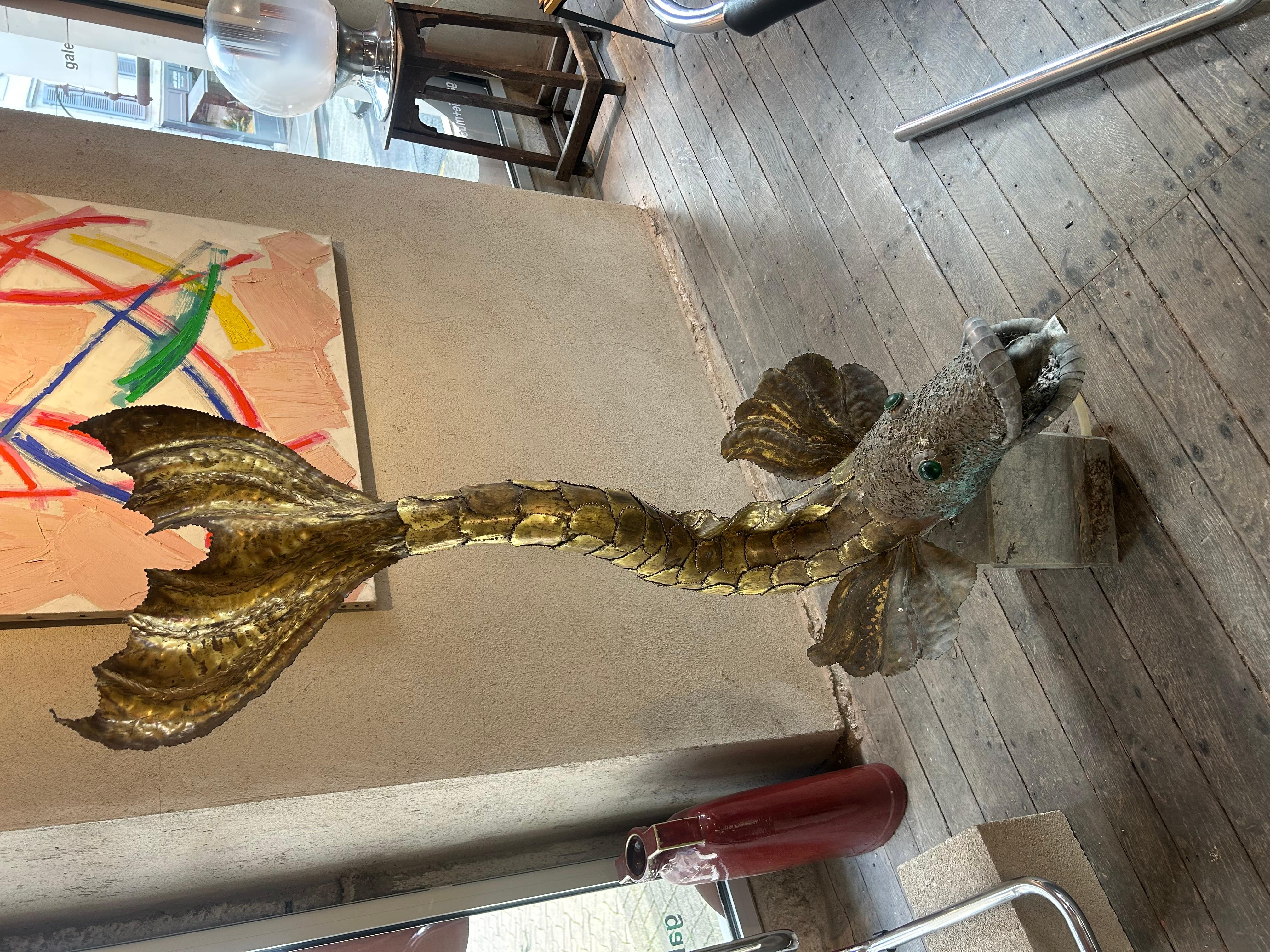 Henri Fernandez gold brass fish fountain.
Green eyes in stone 
Nice patina 