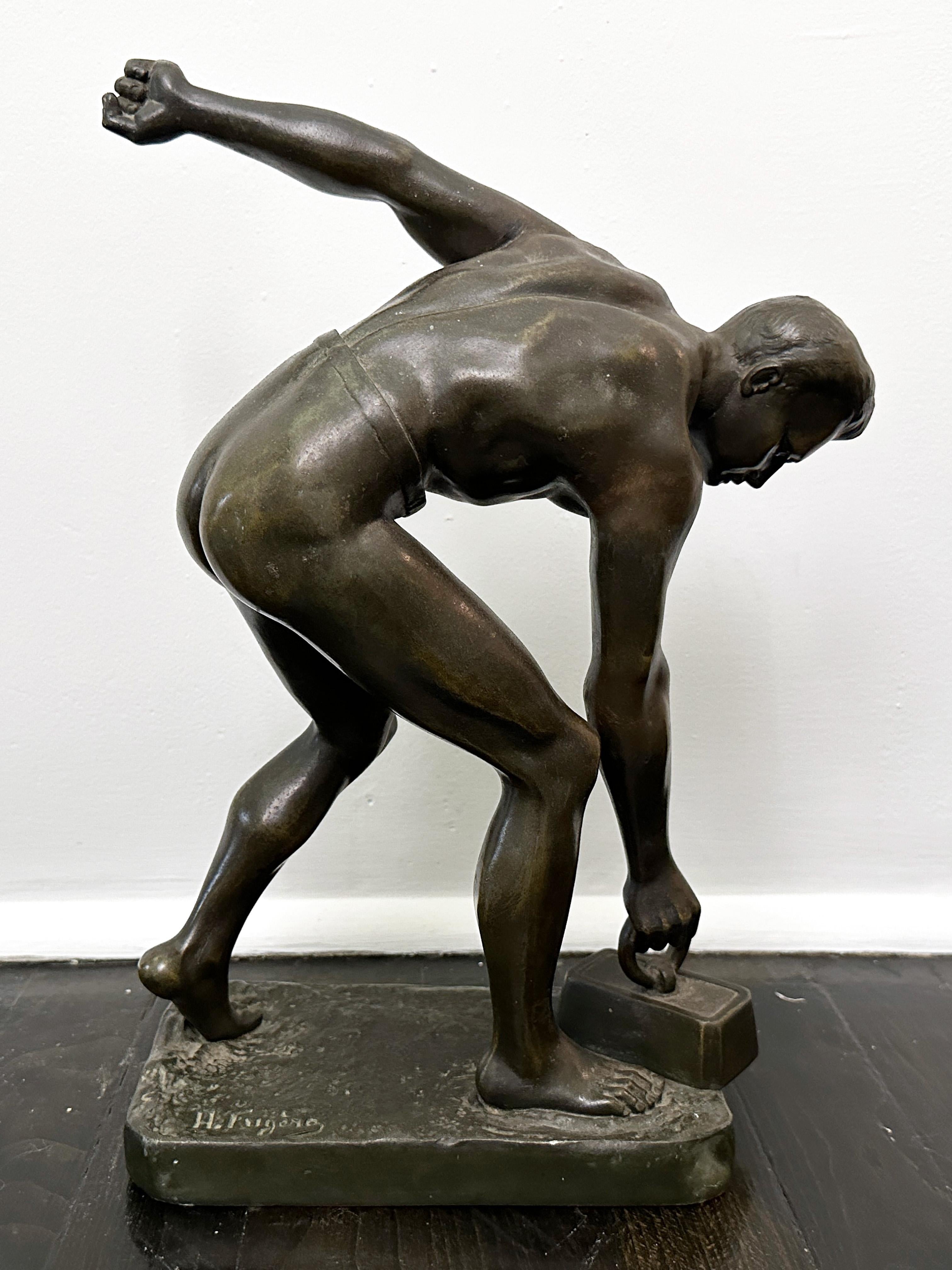 Bronze sculpture depicting a weight lifter by the French artist Henri Fugère. Titled  
