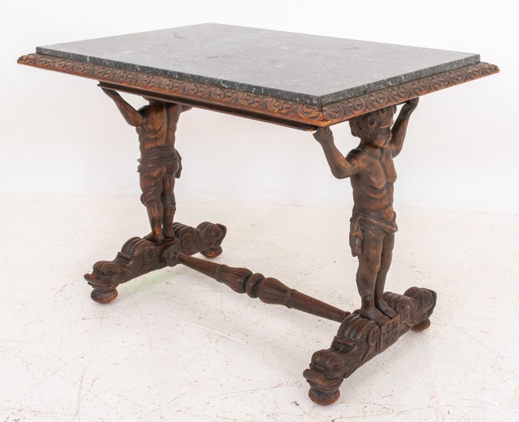 French Henri II Gothic style side or coffee table in richly carved oak, mounted on two figural leg pedestals depicting cherubs with raised arms and dolphin figures, 