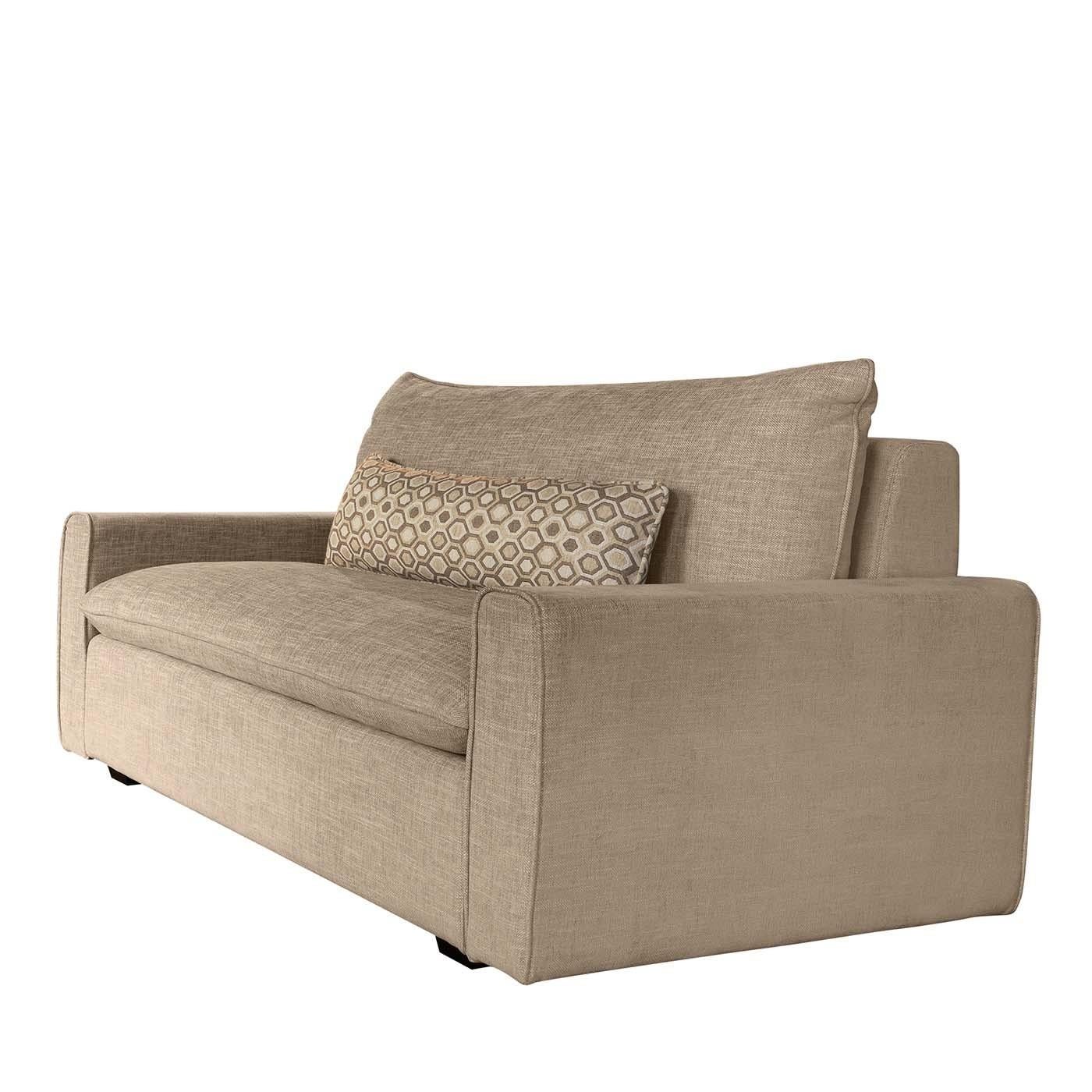 Perfect for small spaces, this loveseat combines elegance and comfort in a superbly-crafted design. The plywood frame is raised on block feet finished in black lacquer that contrasts with the ivory hue of the Dacron fabric covering. The frame is