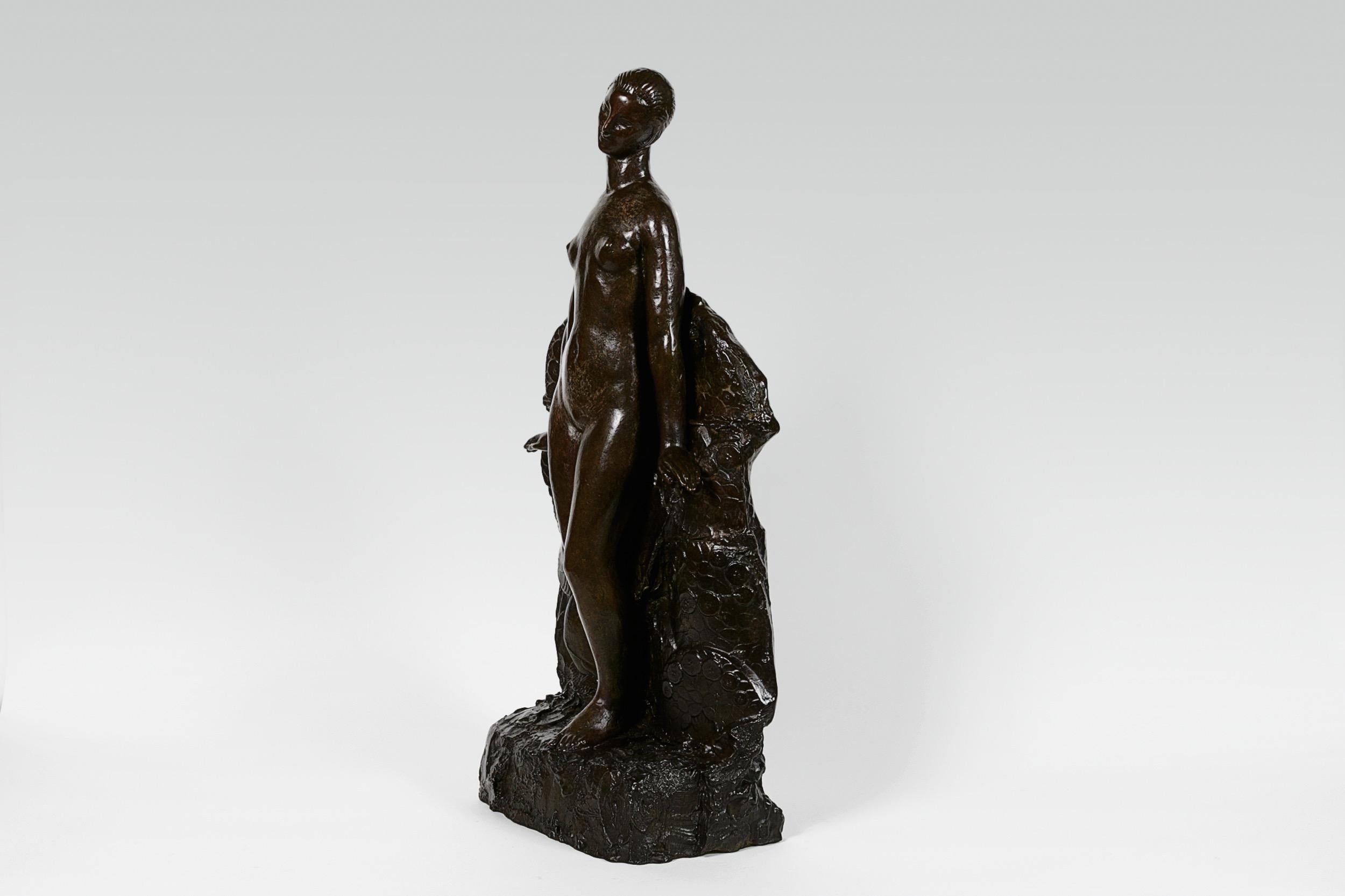 Bronze Art Deco sculpture “Femme aux Colombes” by Henri Louis Bouchard (1875-1960) depicting a young woman standing before a composition of flowers and two doves. Signed, H Bouchard. Monogrammed and stamped, “Fonderie de la Plaine”. Numbered, 1/8.