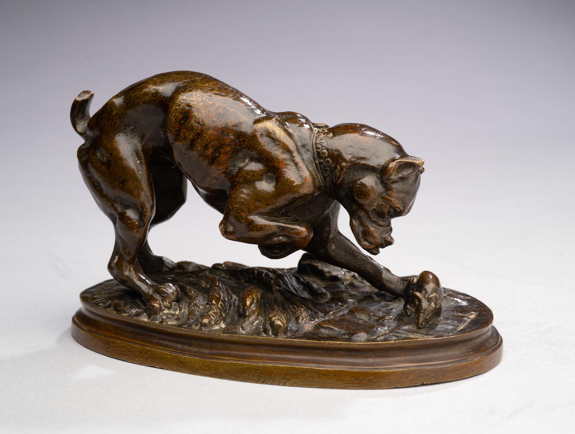 Antique Bronze Dog
Bulldog Playing with a Mouse on Sheaves of Wheat
Henri Émile Adrien Trodoux (1815-1881)
6 1/8 x 3 7/5 inches
Signed on the terrace

Henri Émile Adrien Trodoux (French, 1815-1881) was an accomplished sculptor from the Animalier