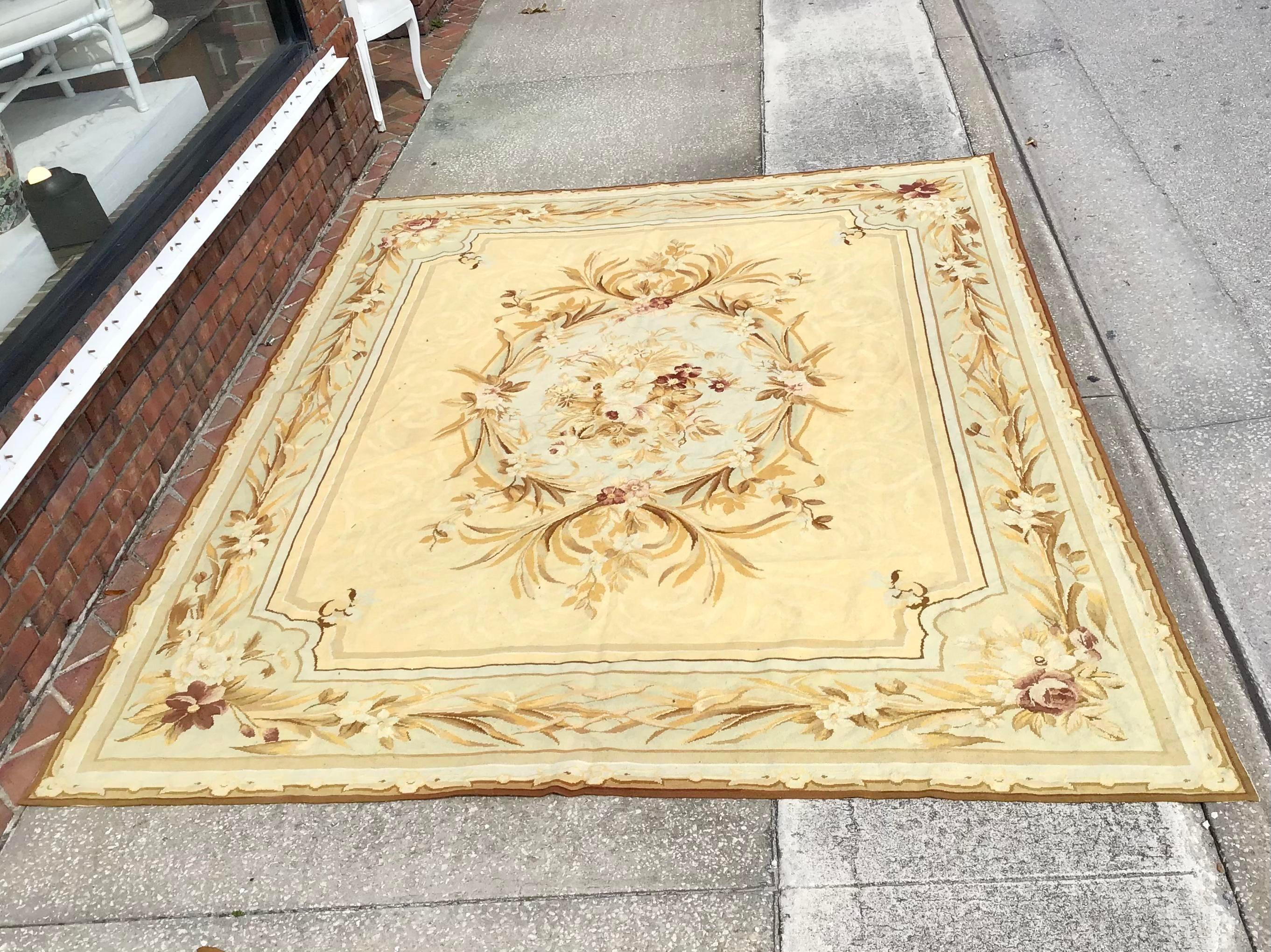 Gorgeous French Aubusson needlepoint carpet in the style of the iconic French designer Henri Samuel. Add some real glamour to your residence withe this very well made French Aubusson. Slightly faded in the perfect kinda way that adds to the