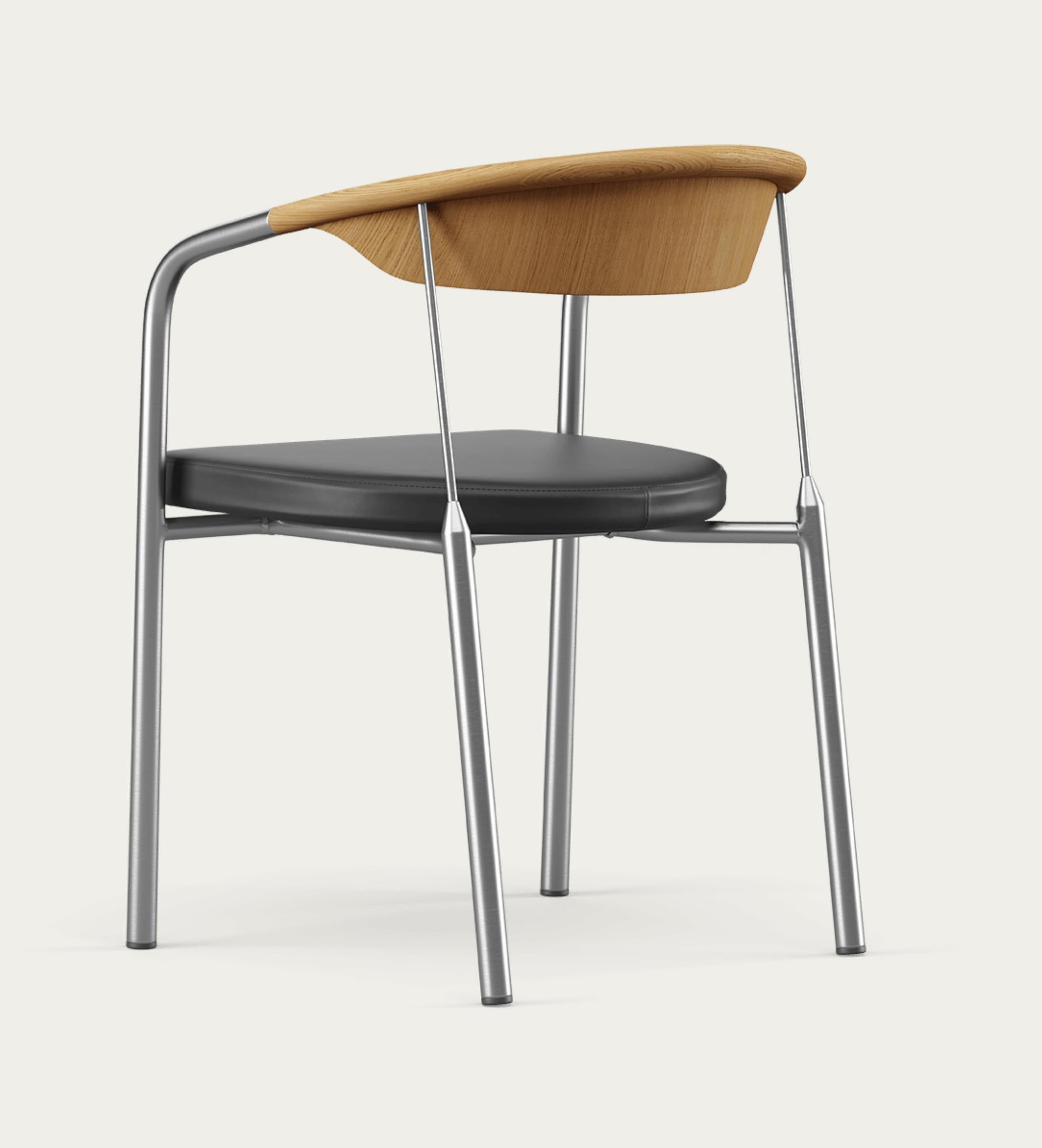 Henrik Tengler Chairman Wood Types: Oak Dark Oil, Upholstery: Black For One Collection 

The Chairman was designed by Henrik Tengler for Onecollection in 1990. Its sleek design is crafted using elegant and appealing materials, such as the brass
