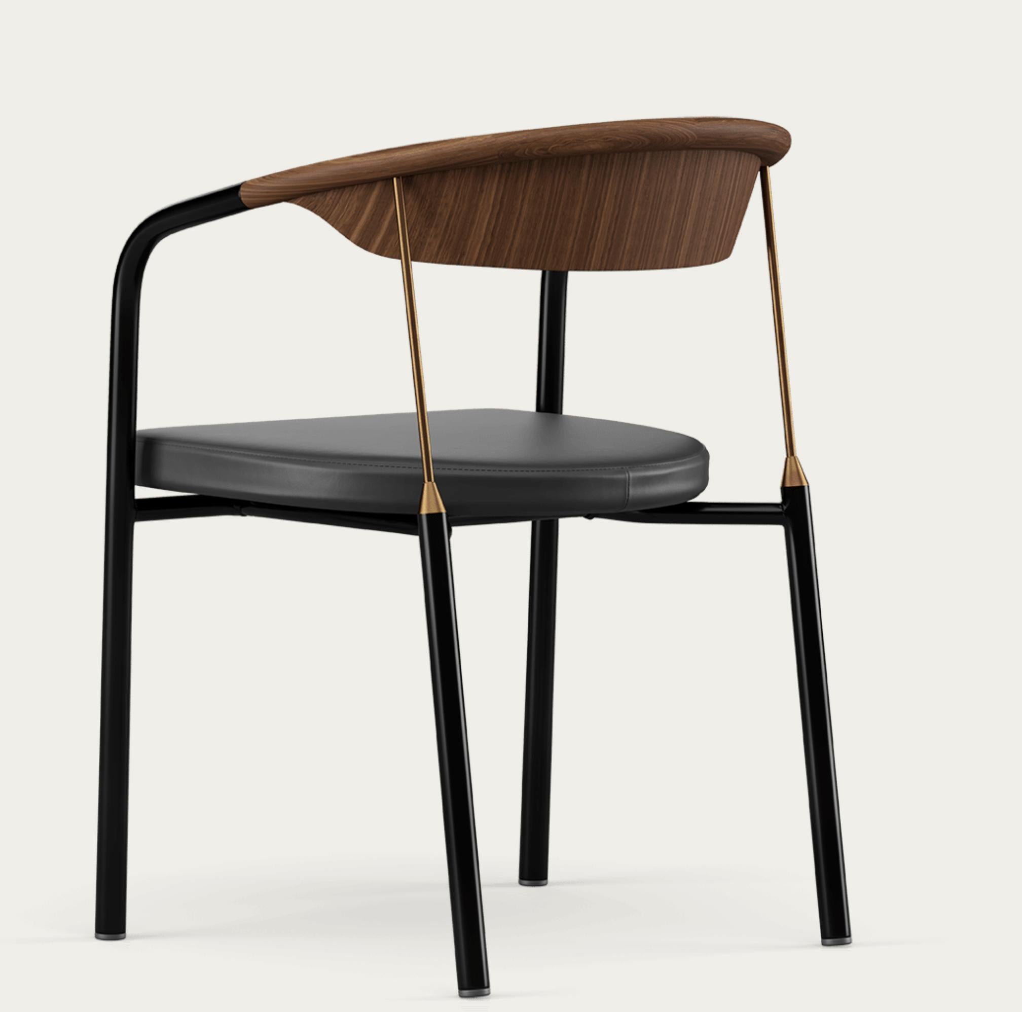 Henrik Tengler Chairman Wood Types: Walnut, Upholstery: Black For One Collection 

The Chairman was designed by Henrik Tengler for Onecollection in 1990. Its sleek design is crafted using elegant and appealing materials, such as the brass details.