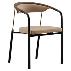 Henrik Tengler Chairman Wood Types: Walnut Upholstery: Lime For One Collection