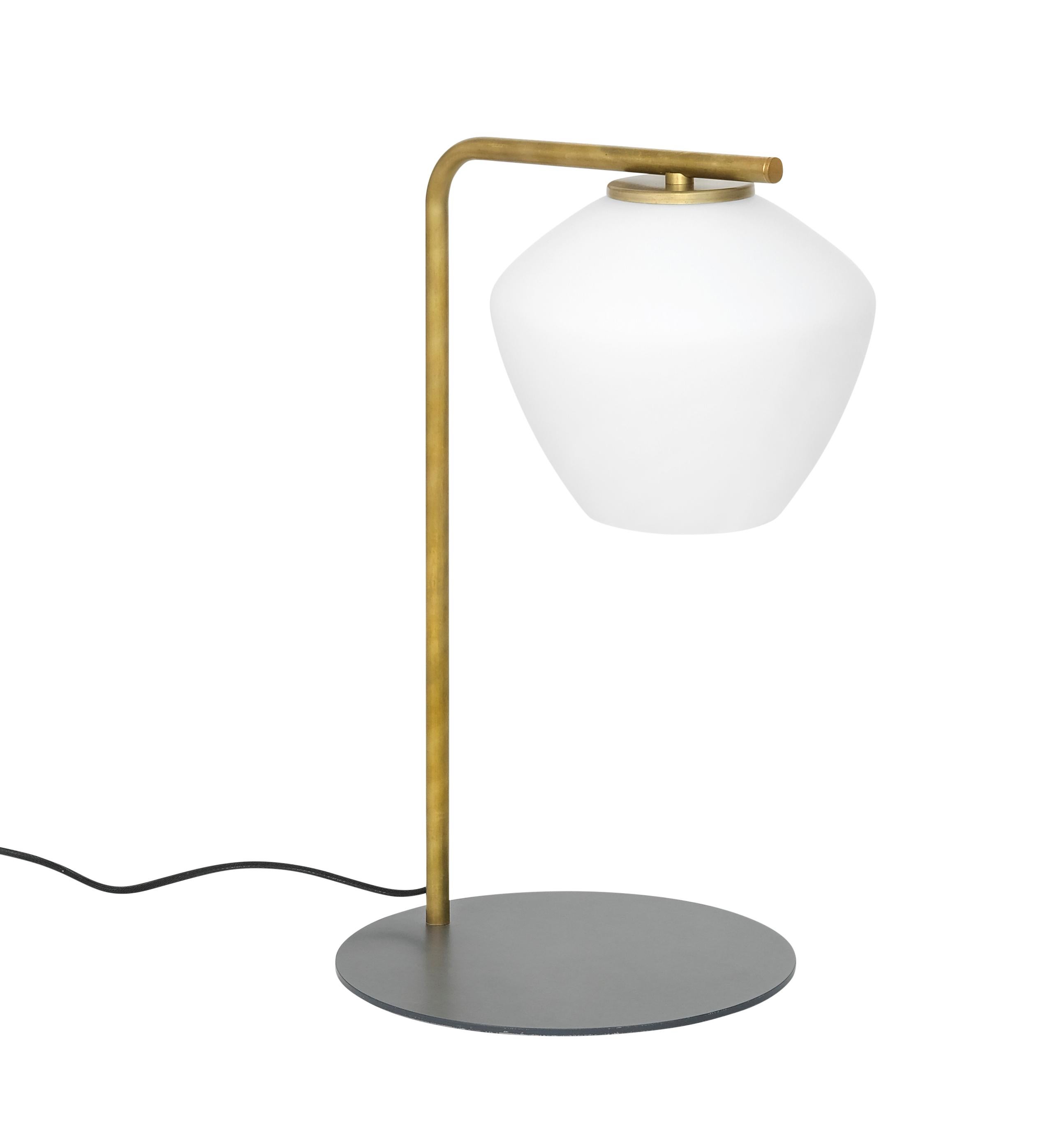 Table lamp model DK designed by Henrik Tengler and manufactured by Konsthantverk.

The production of lamps, wall lights and floor lamps are manufactured using craftsman’s techniques with the same materials and techniques as the first