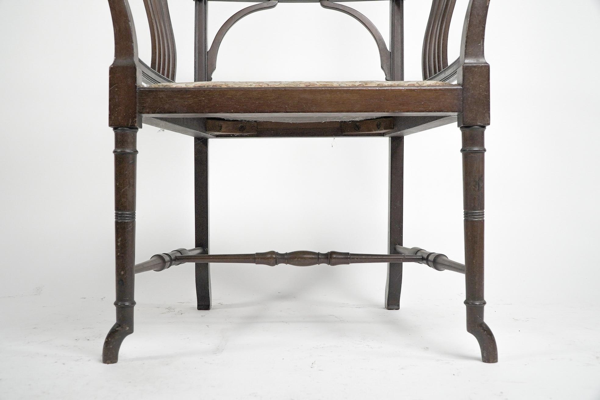 Henry W Batley attr. An Aesthetic Movement walnut armchair with sinuous touches. For Sale 1