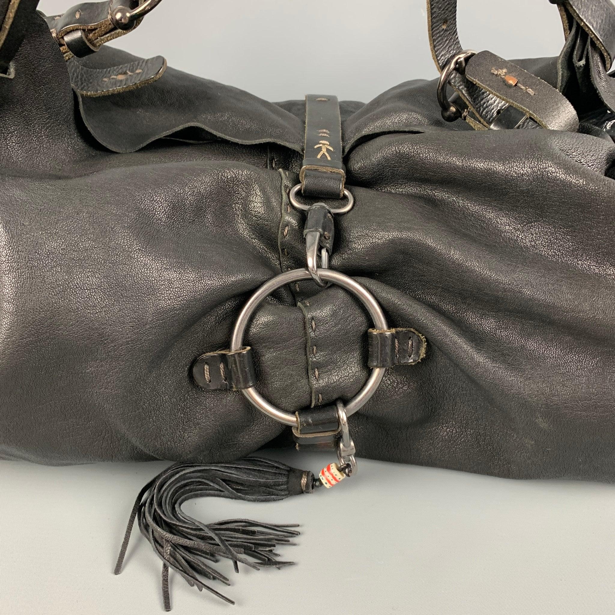 HENRY BEGUELIN bag comes in a black distressed leather featuring top handles, wallet attachment, silver ton hardware, and a front clasp closure. Includes tags & dust bag. Very Good Pre-Owned Condition. 

Measurements: 
  Length: 21 inches  Width: 10