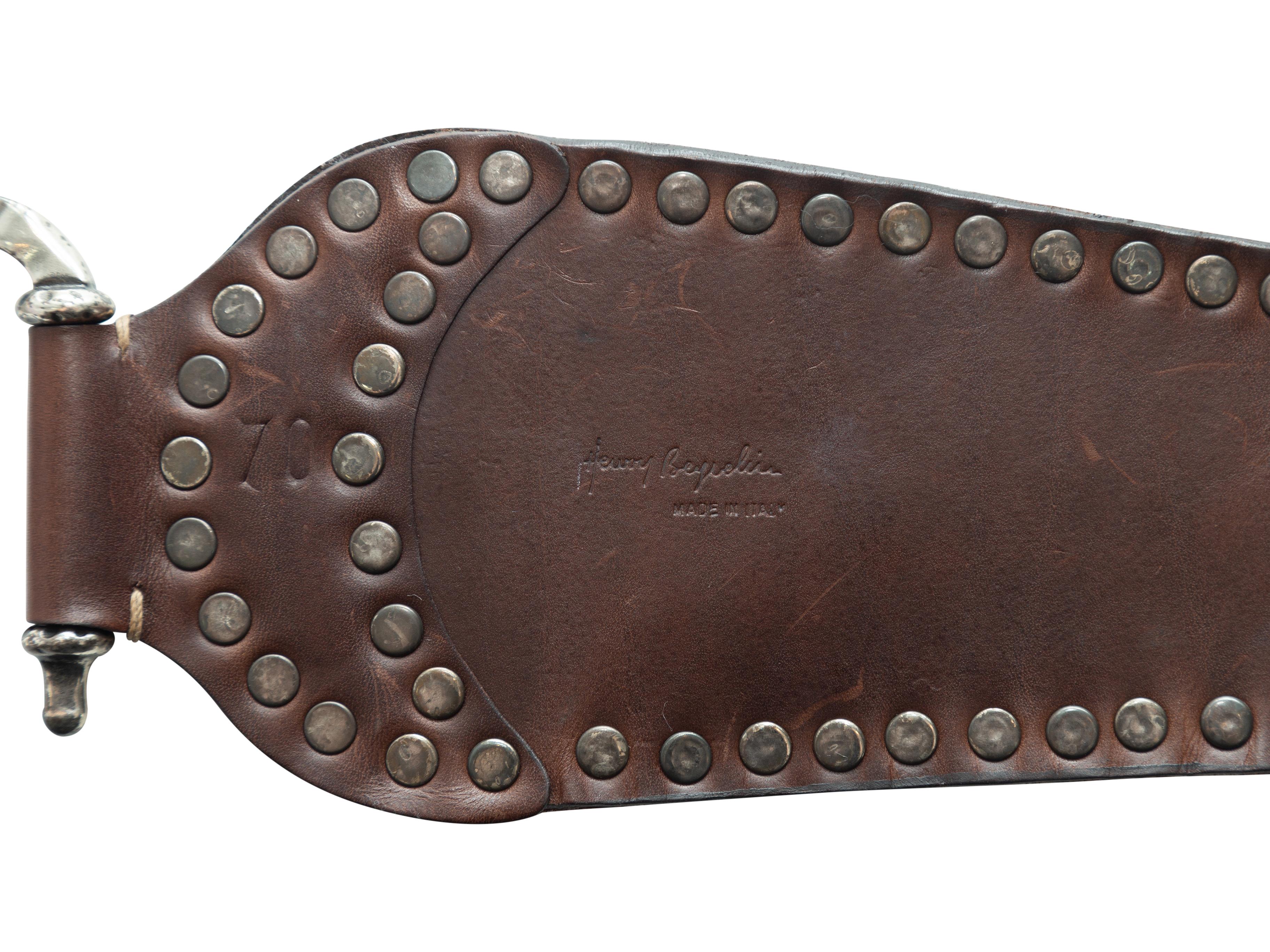 Product Details: Dark brown leather textured studded belt by Henry Beguelin. Silver-tone hook closure at front. 3.5