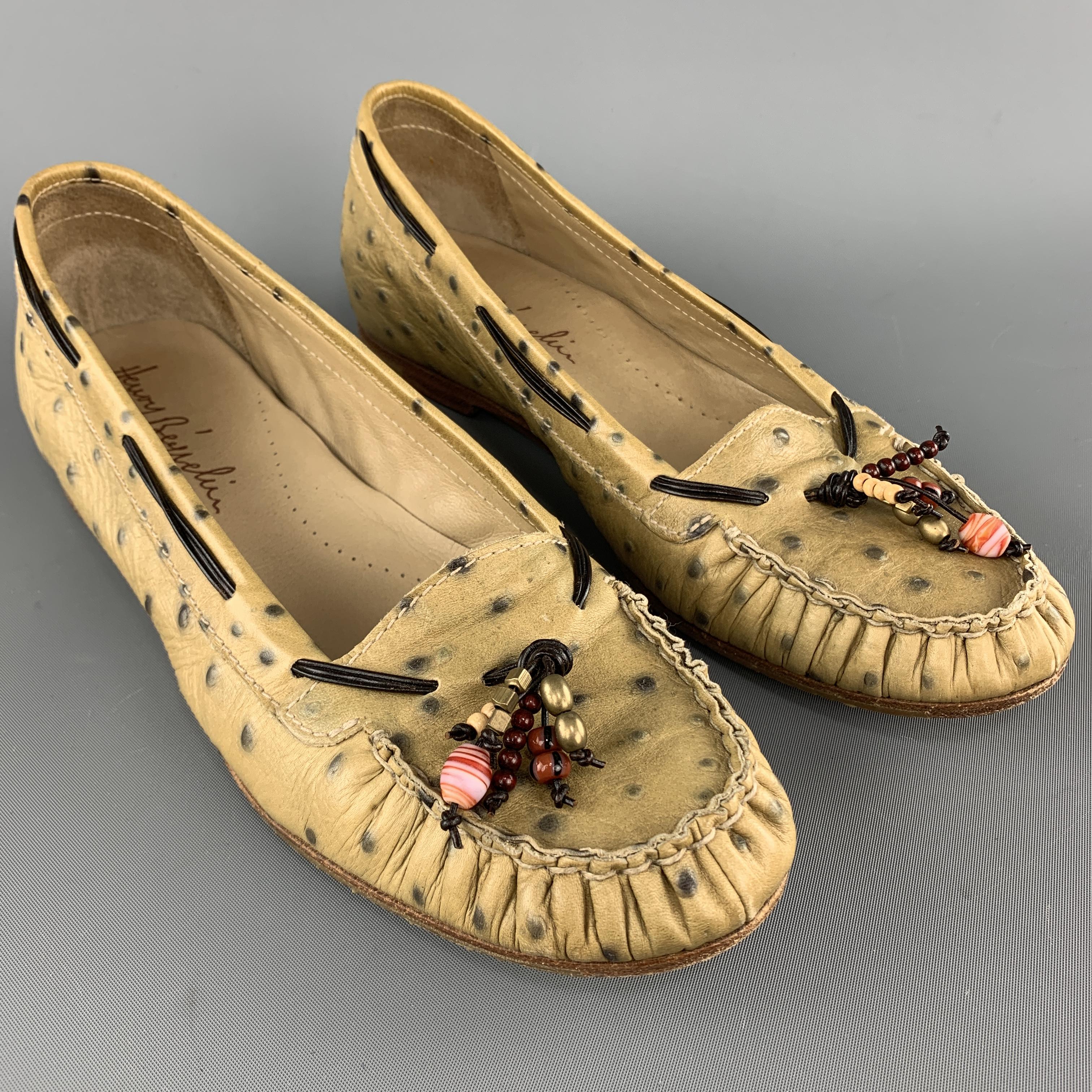HENRY BEGUELIN loafers come in muted green beige ostrich leather with woven trim and beaded tassel. Handmade in Italy.

Excellent Pre-Owned Condition.
Marked: IT 36.5

Outsole: 10 x 3.5 in.