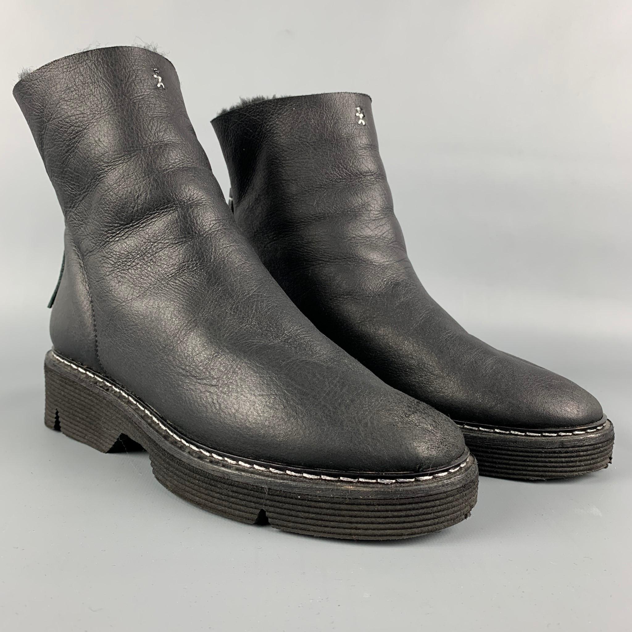 HENRY BEGUELIN ankle boots comes in a black shearling featuring stitching details, rubber sole, and a back zipper closure. 

Very Good Pre-Owned Condition.
Marked: 37

Measurements:

Length: 10 in.
Width: 3.5 in.
Height: 5.5 in. 